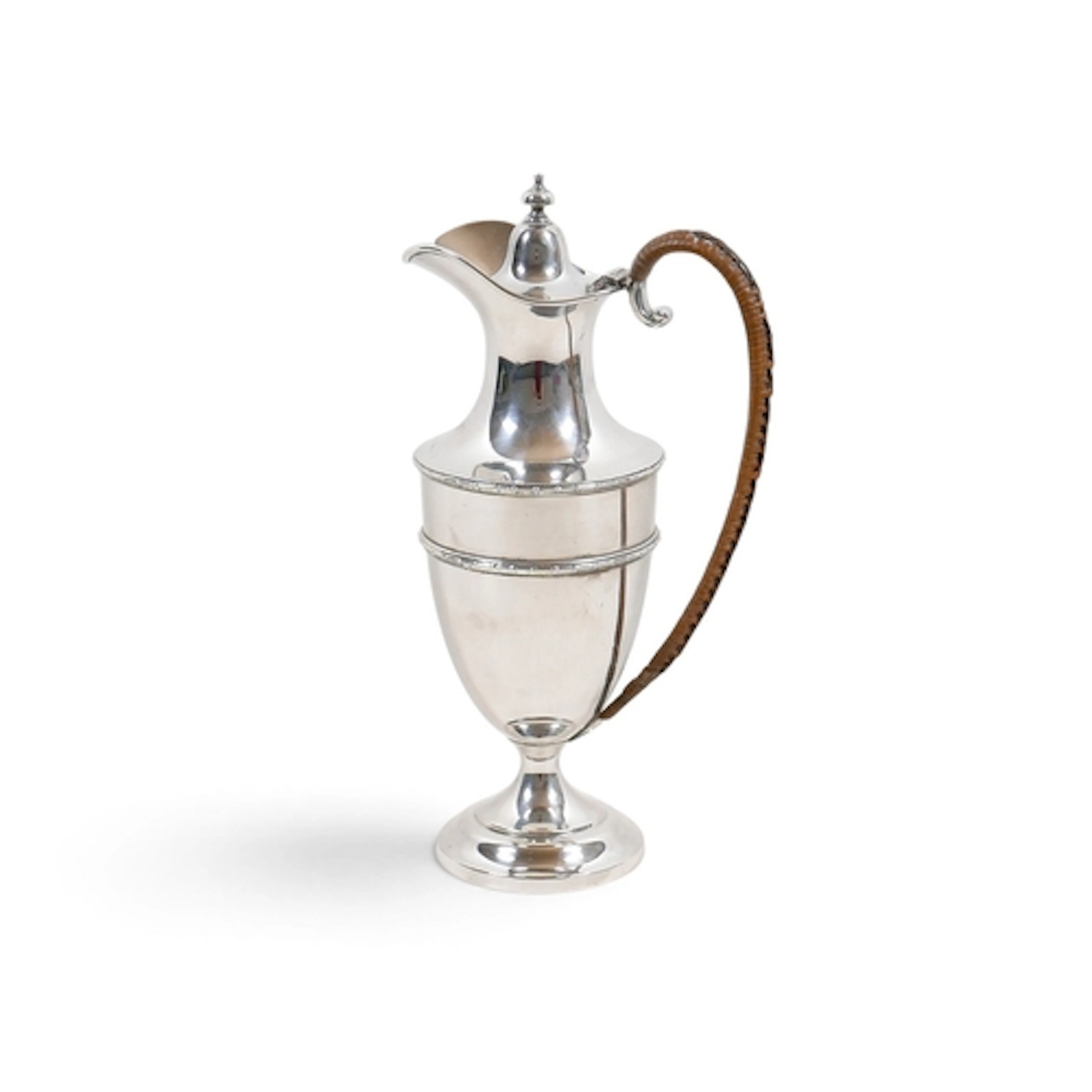 A GEORGE V SILVER EWER. with urn shaped body, beaded edge de...