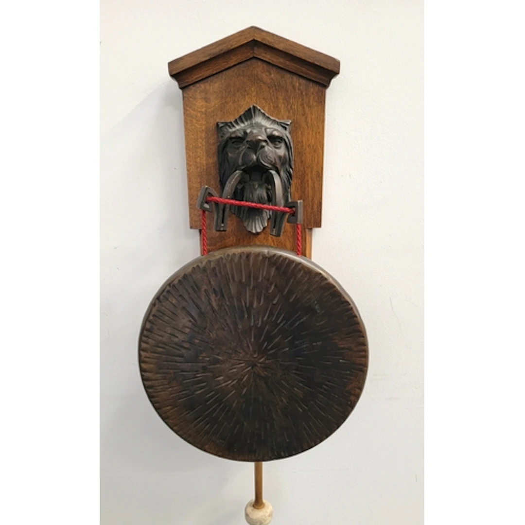 VICTORIAN WALL-MOUNTED DINNER GONG the spelter lion's head m...