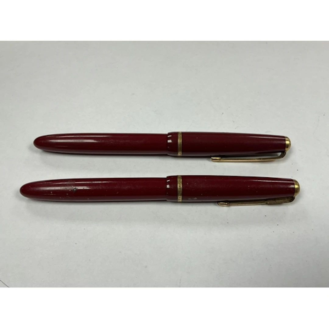 Two Parker fountain pens - 1950's in burgundy
