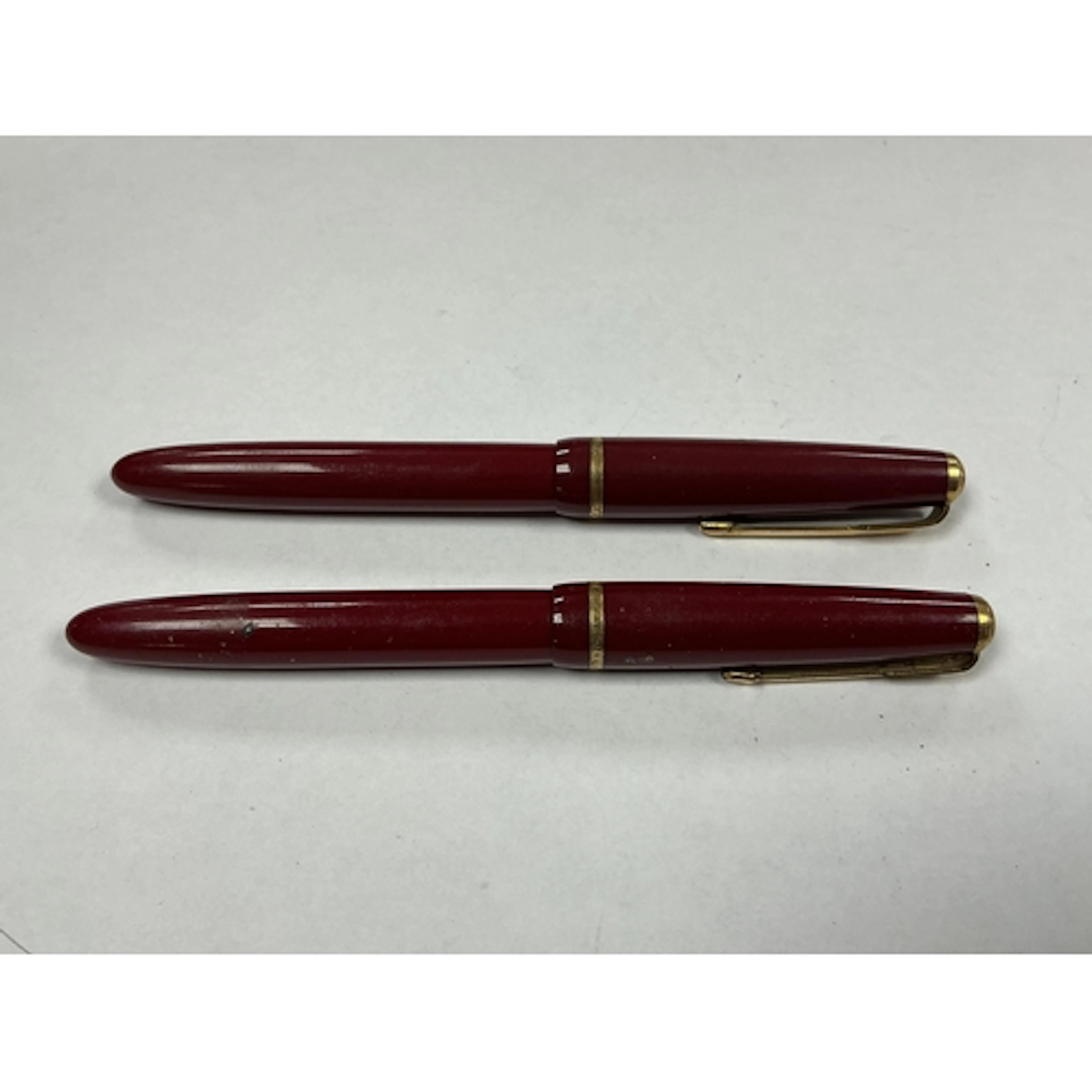 Two Parker fountain pens - 1950's in burgundy