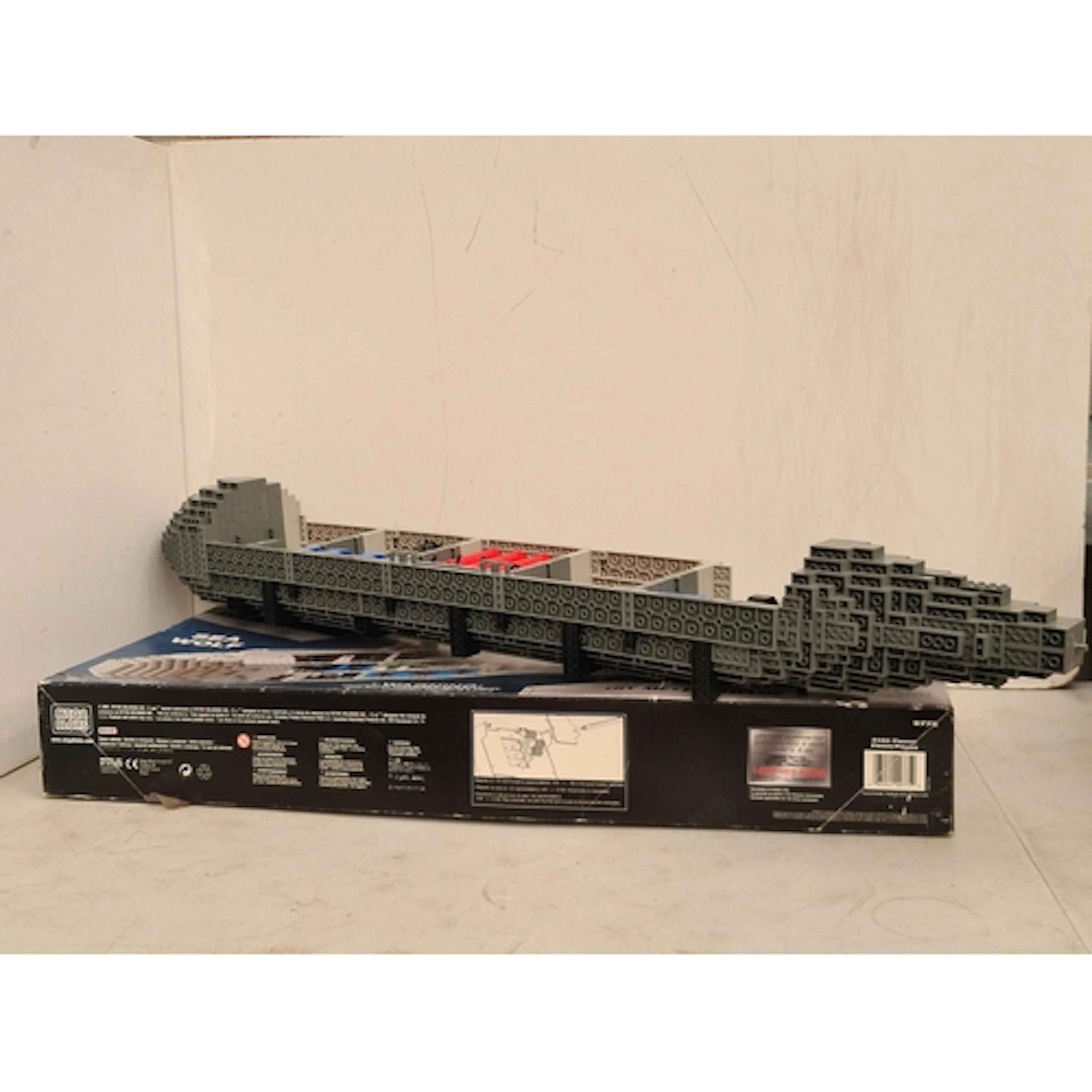 A Mega Bloks ProBuilder 2450 Sea Wolf, part constructed with...