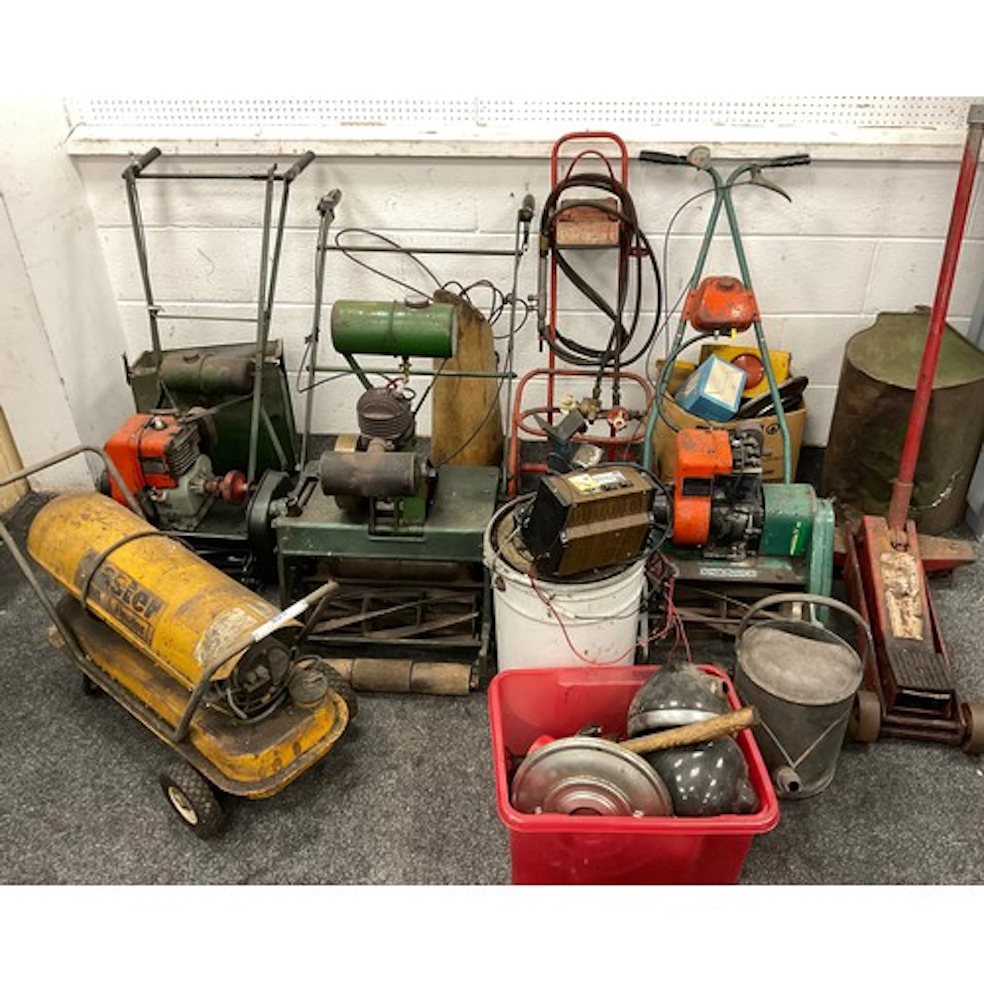 A selection of petrol Lawn Mowers; a Suffolk Punch 30 petrol...