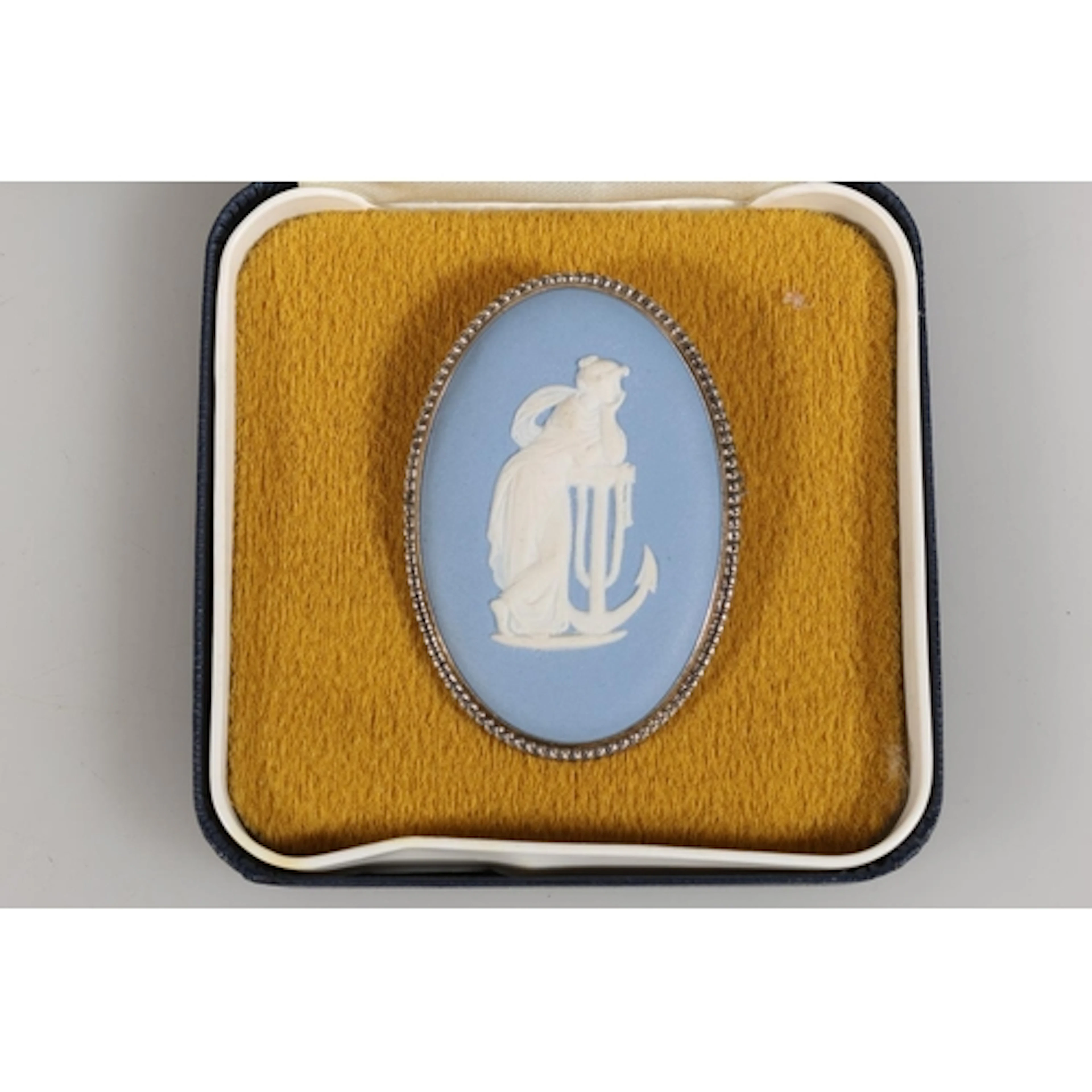 Wedgwood Jasperware oval brooch held in original box.
