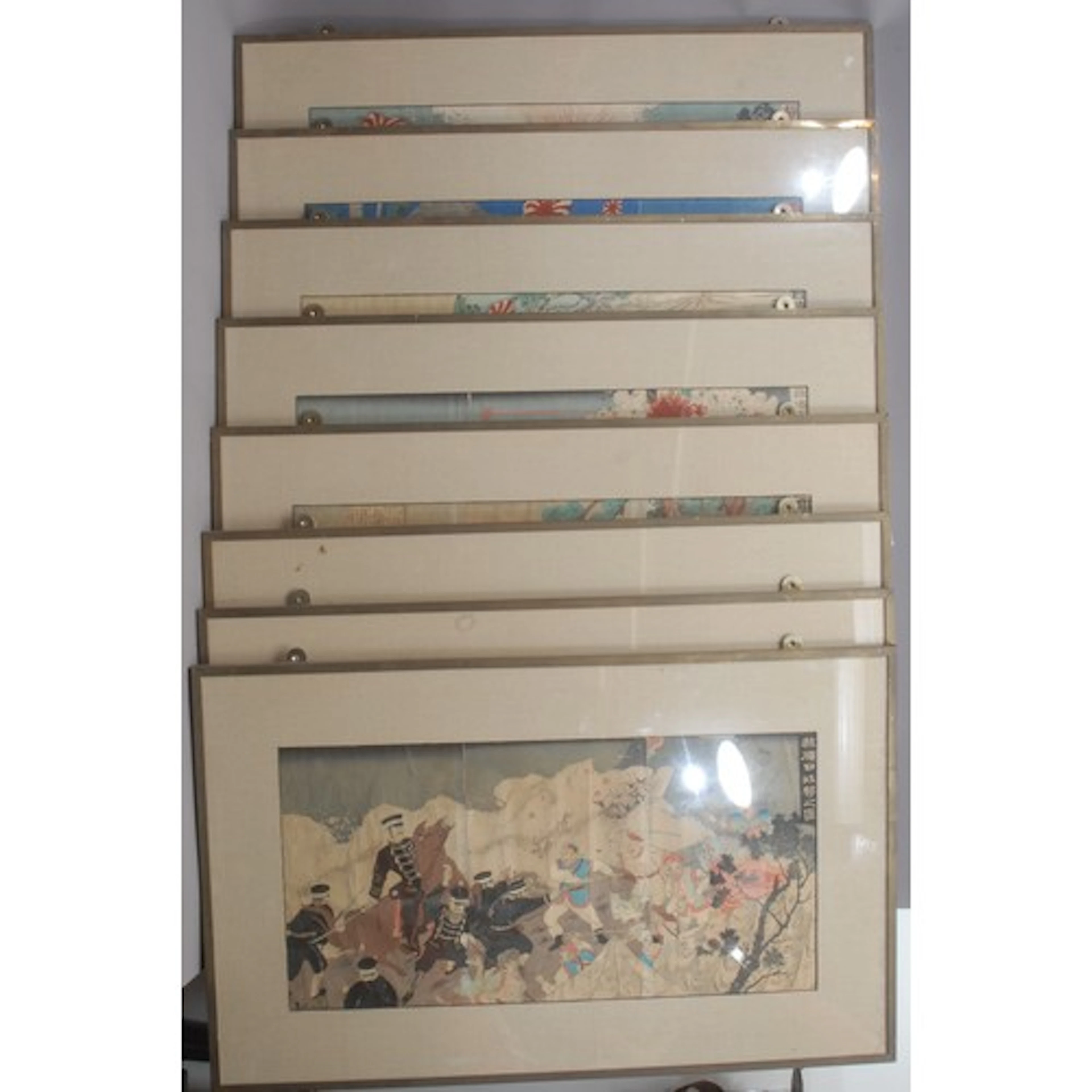 Japanese School (Meiji period), a suite of eight triptych wo...