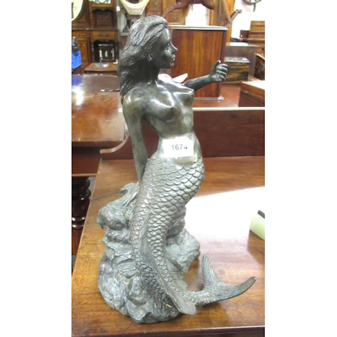 Green patinated bronze figure of a mermaid, 30cm high