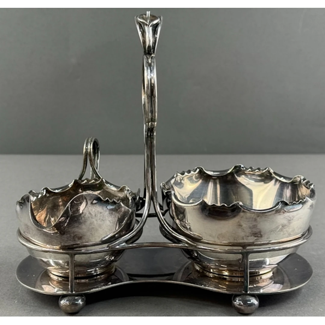 Silver: an Edward VII table jug and bowl set by James Dixon,...
