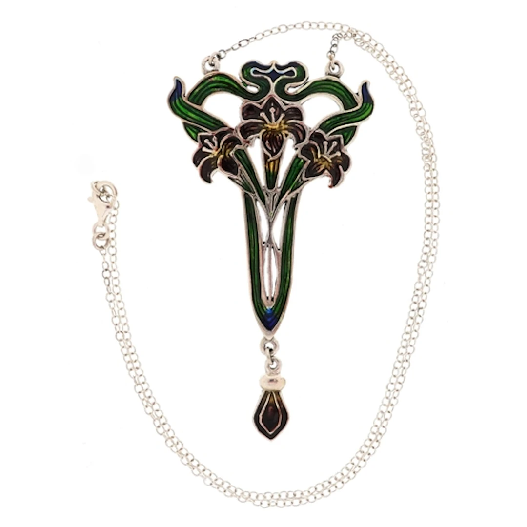 Art Nouveau style sterling silver and enamel brooch on a sil...