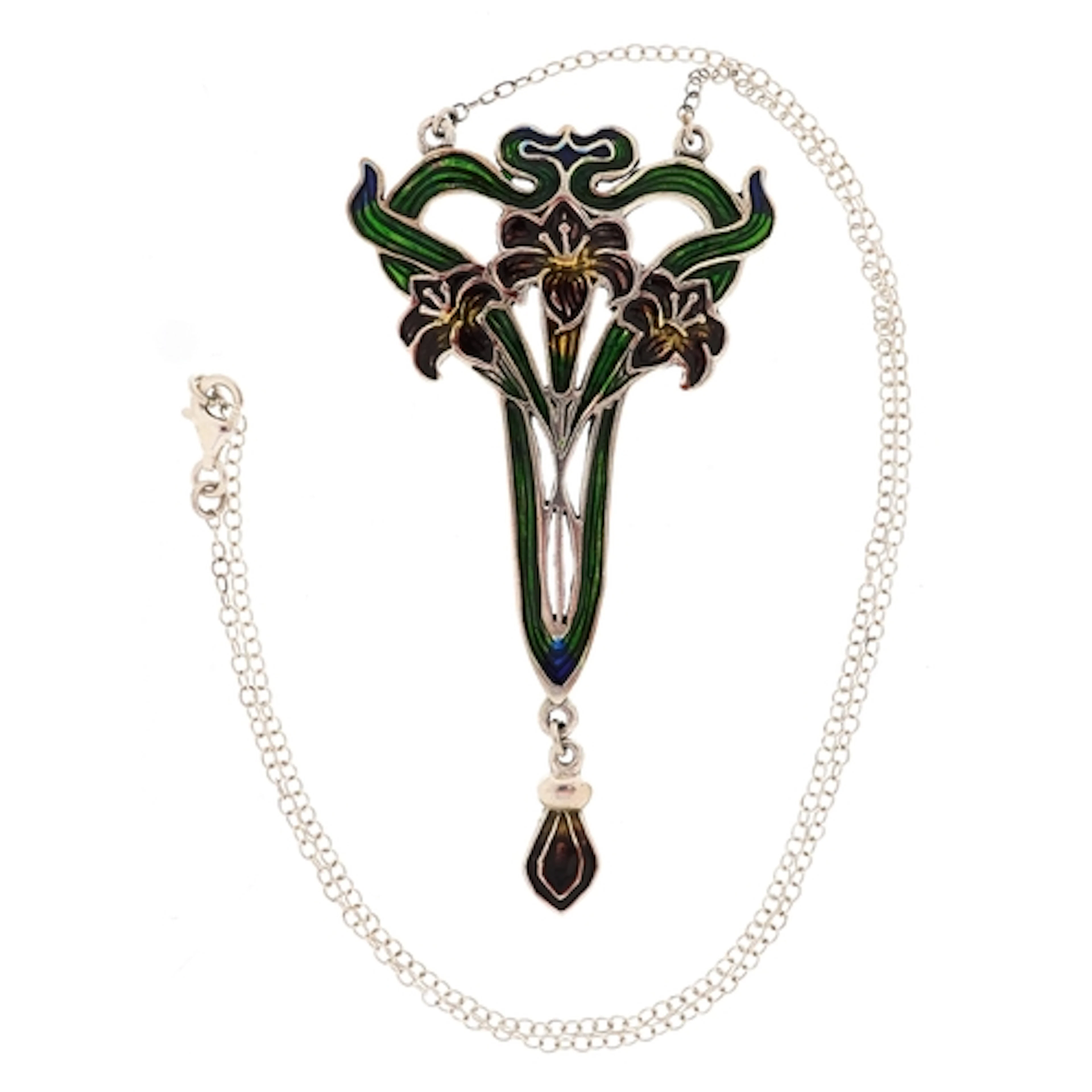 Art Nouveau style sterling silver and enamel brooch on a sil...