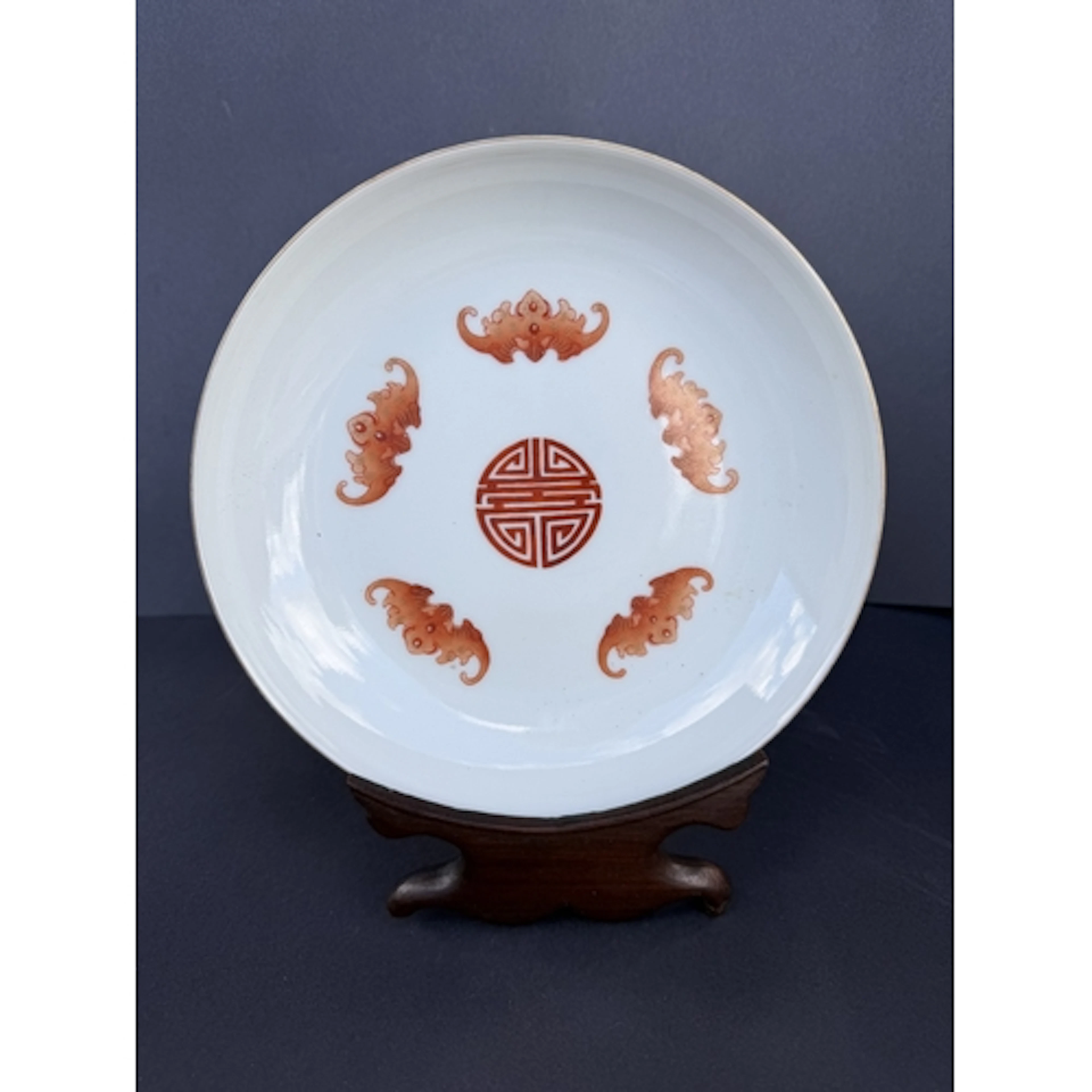 A Chinese porcelain saucer dish, the inner decorated with fi...
