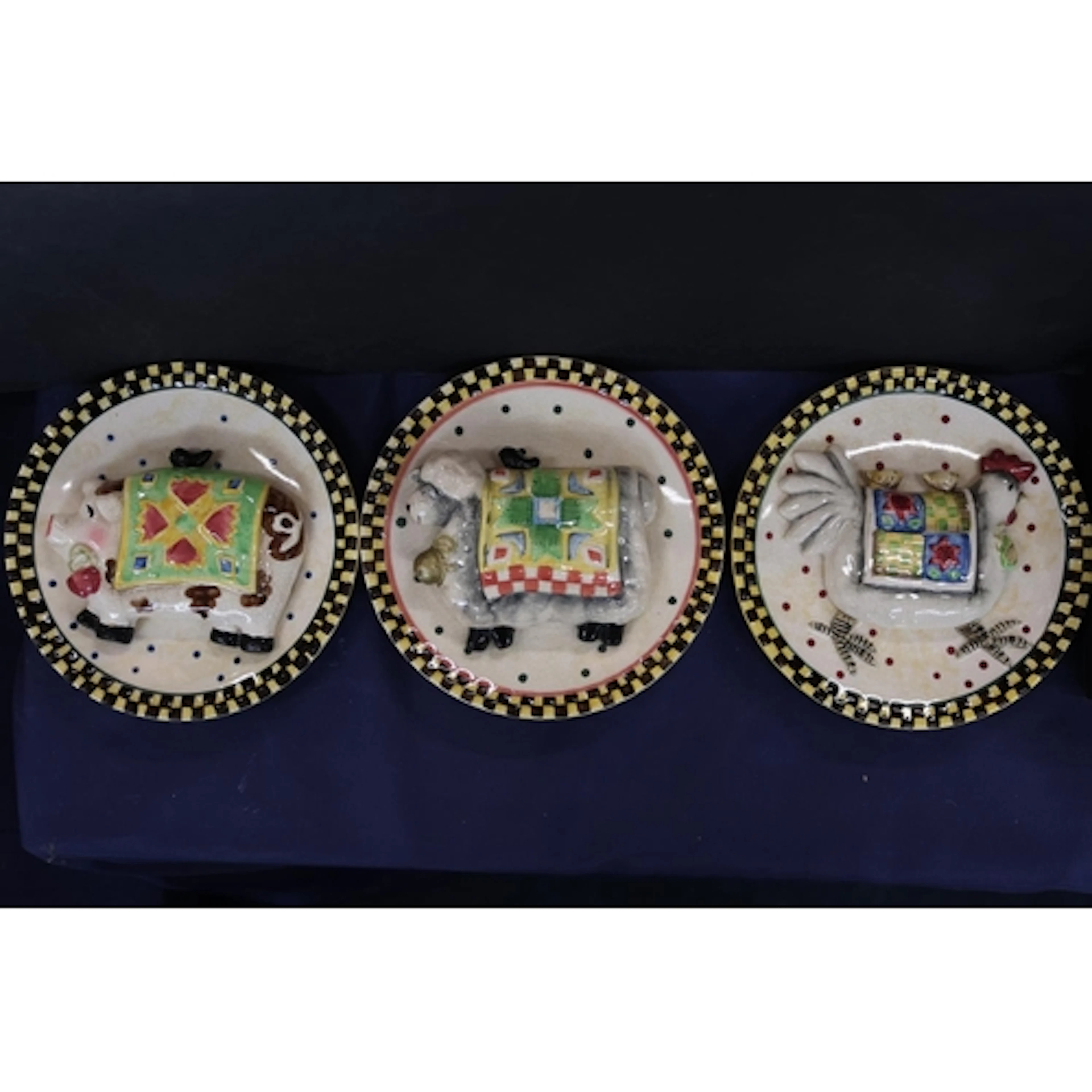 Ganz Folk Art wall plaques, each decorated with a farmyard a...
