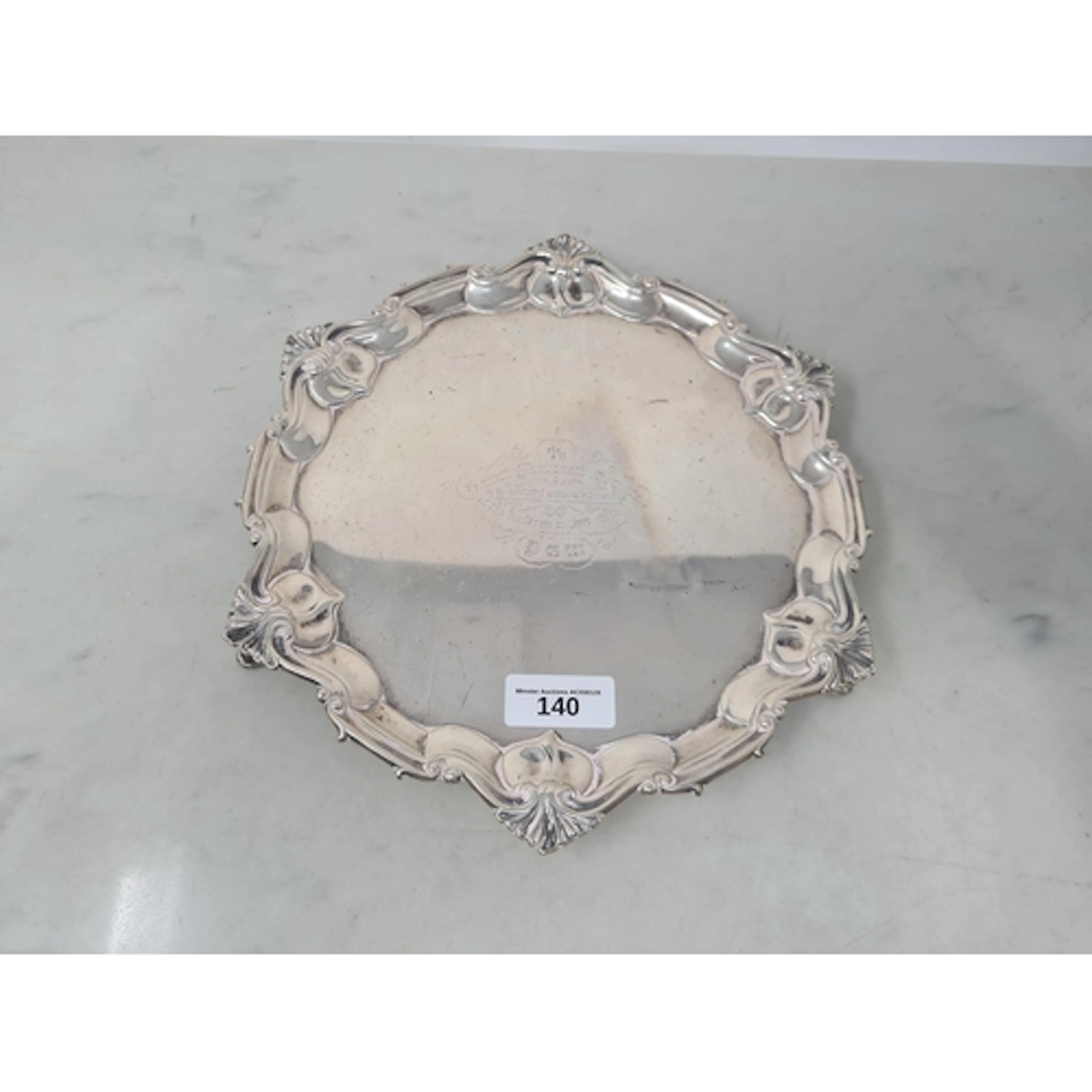 A Victorian silver shaped circular Salver with presentation ...