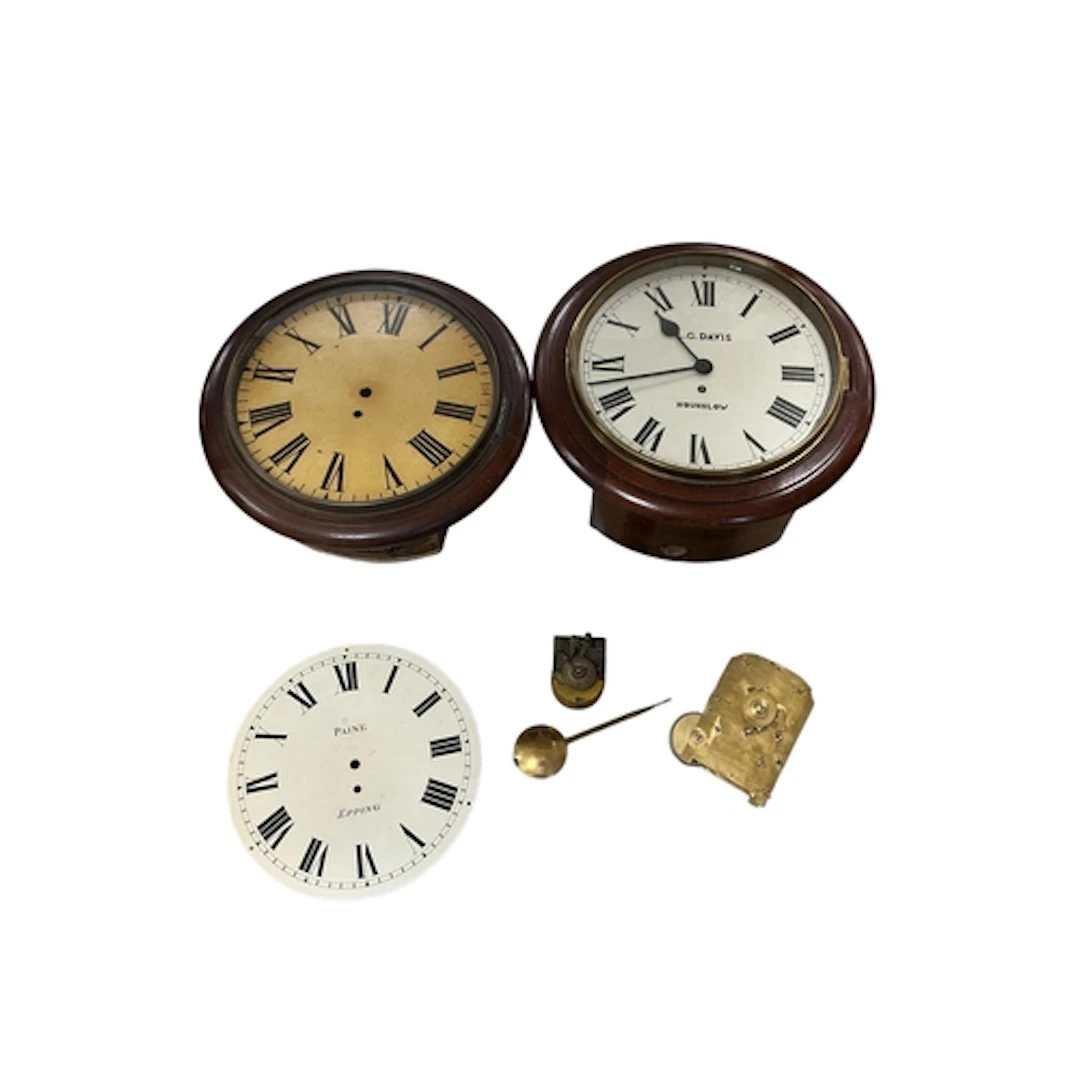 A group of clock parts, comprising two mahogany-cased wall c...