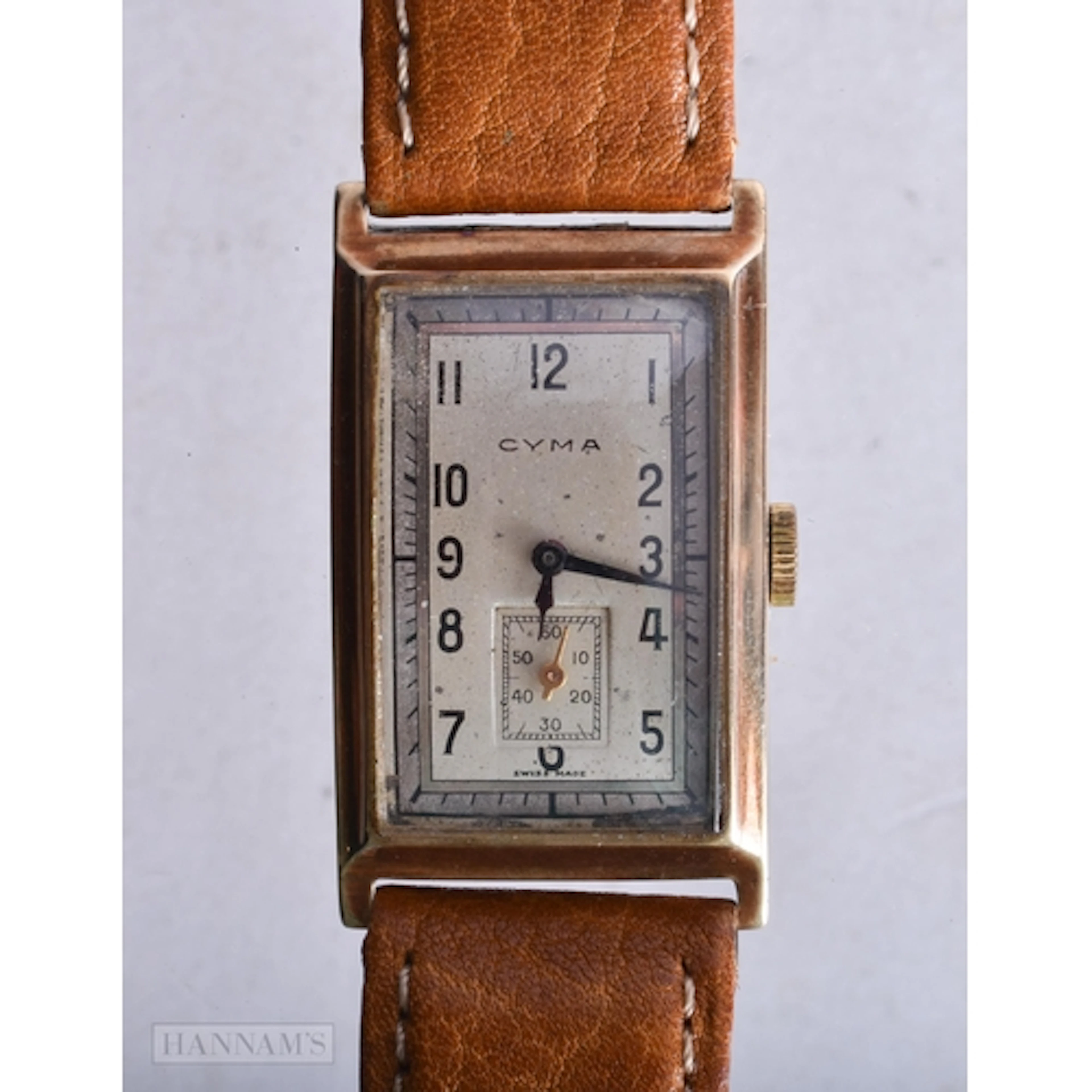 AN ART DECO CYMA WRIST WATCH. Running. 2 cm x 3.5 cm.