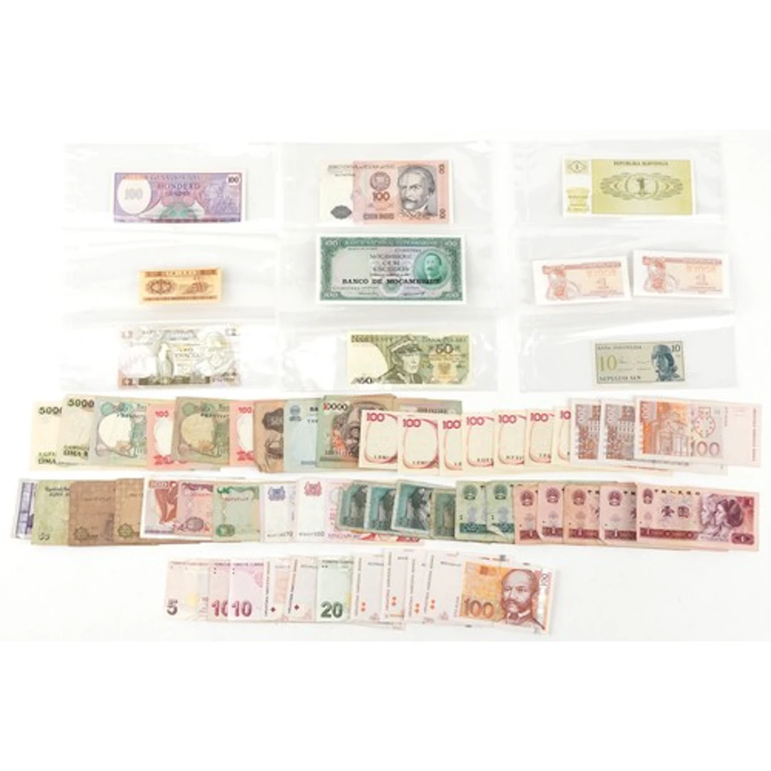 Collection of vintage banknotes including China, Singapore, ...