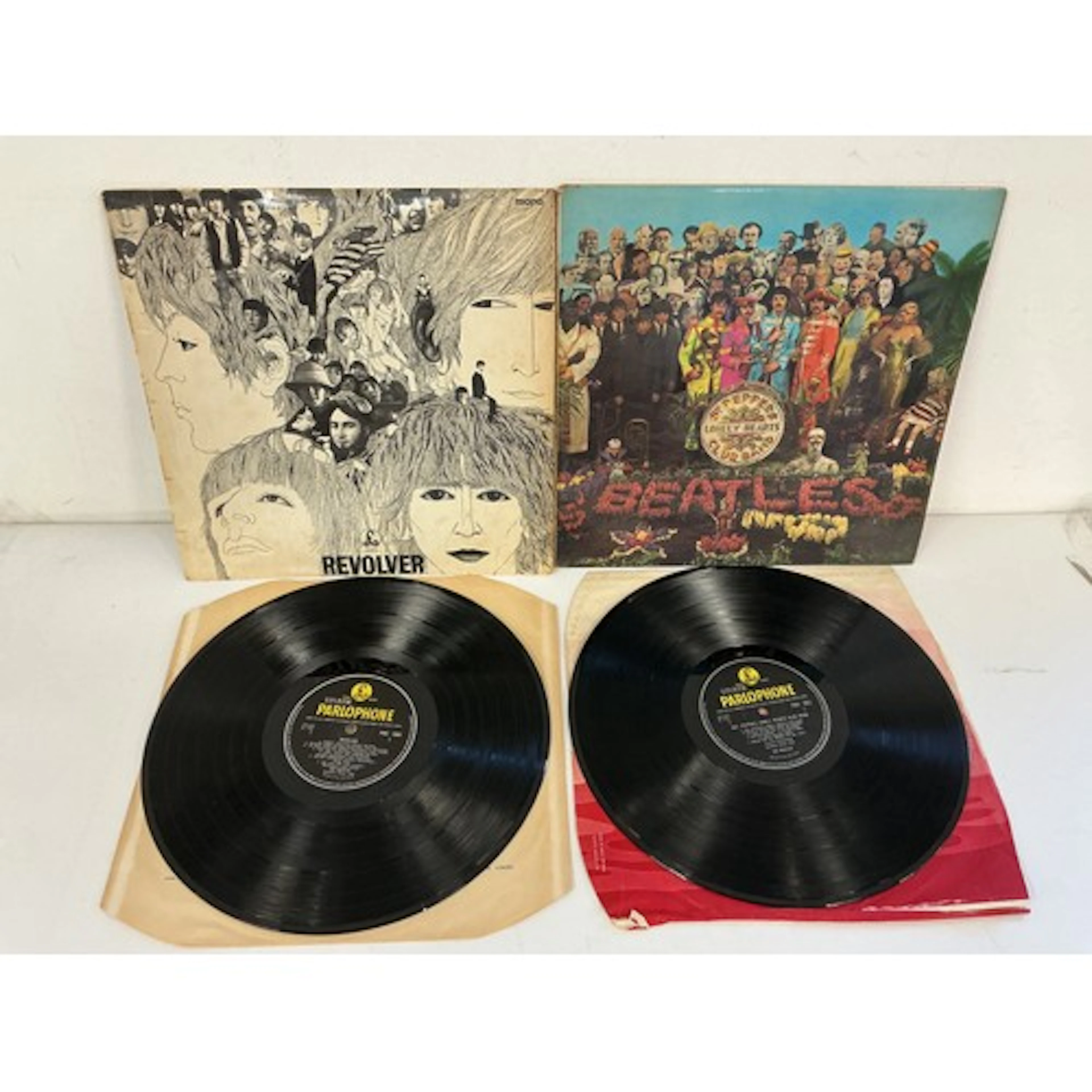 Two Beatles LPs comprising a first UK mono pressing of Revol...