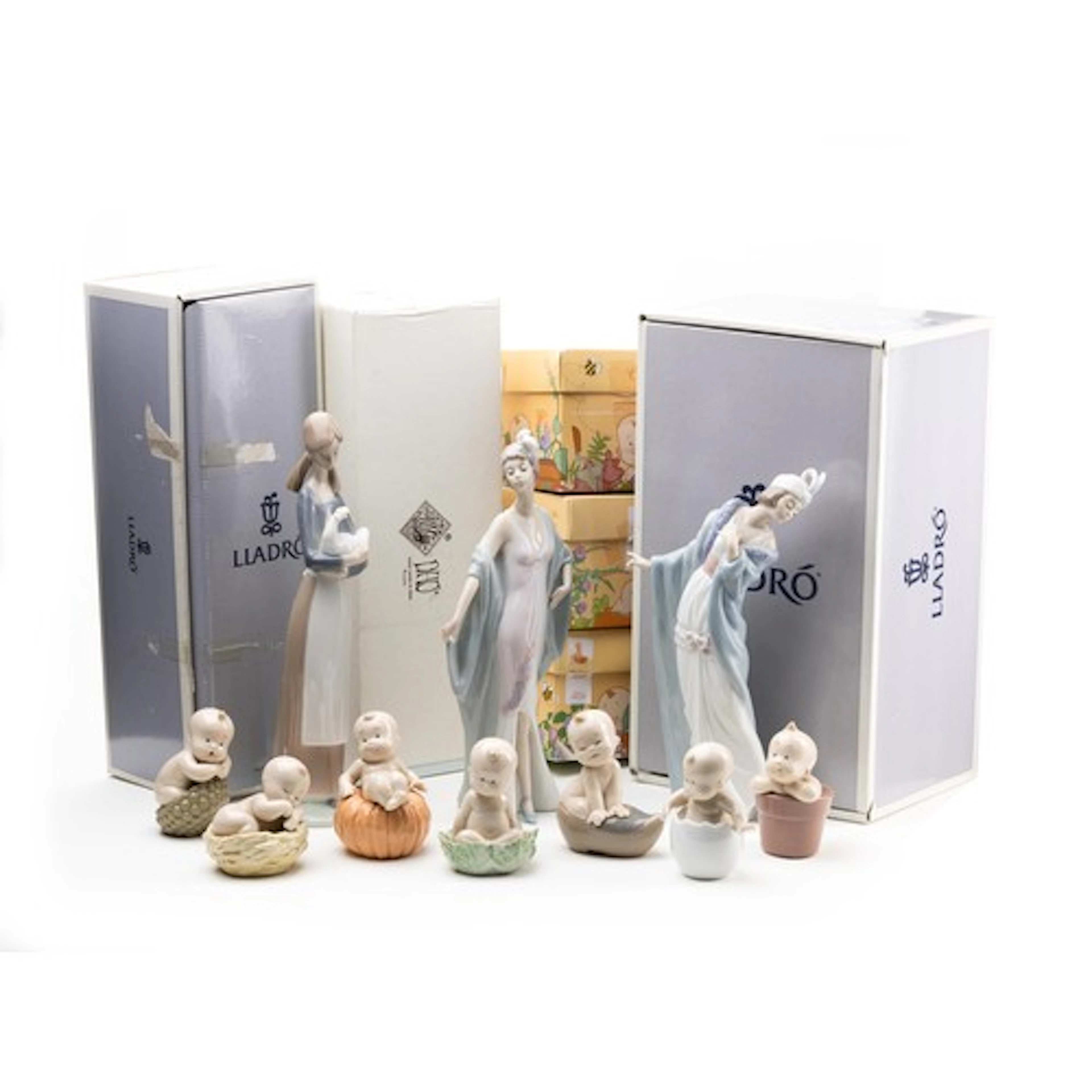 A collection of Lladro figures, includes "The Flirt" 5789 an...