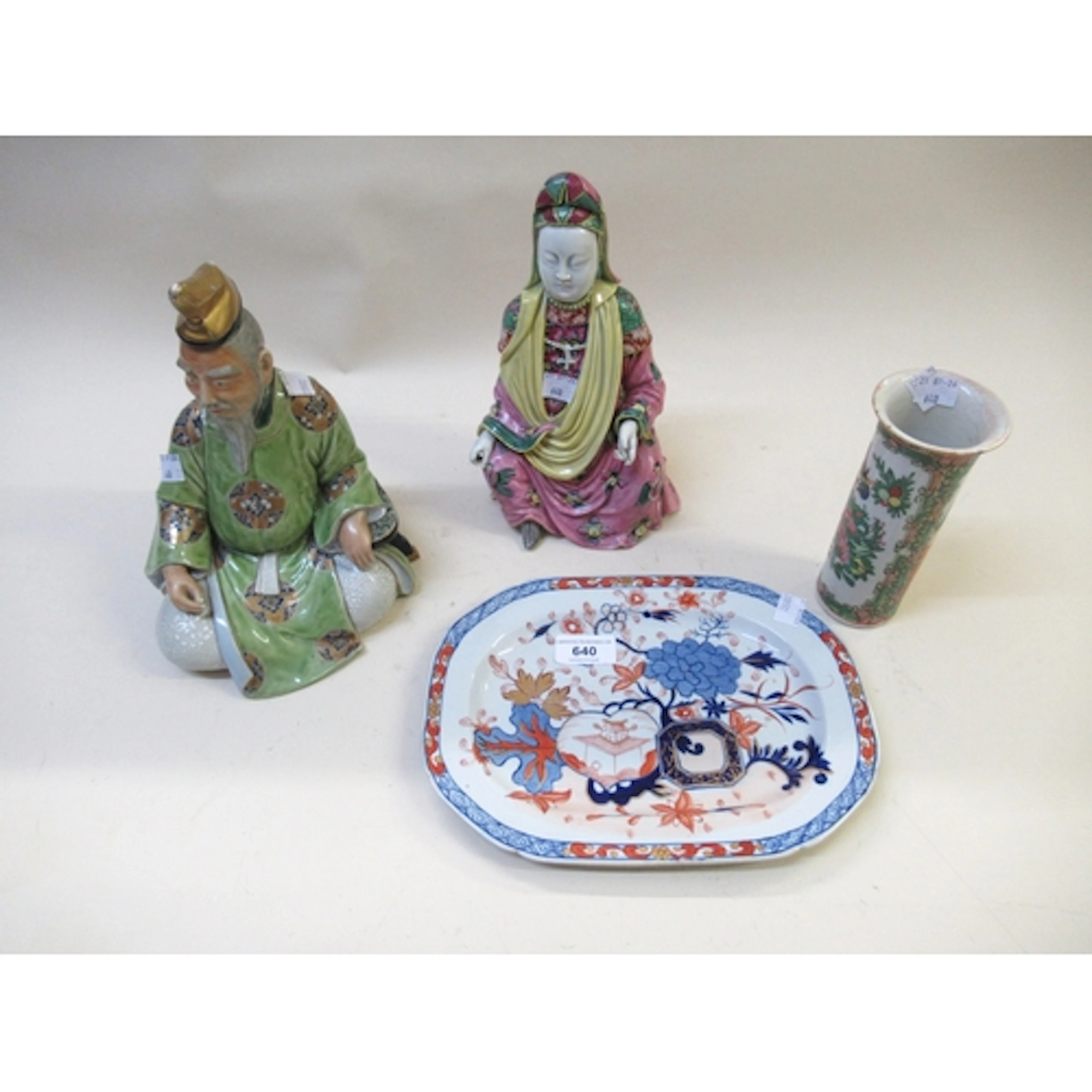 Chinese porcelain figure of a seated sage, wearing a green r...