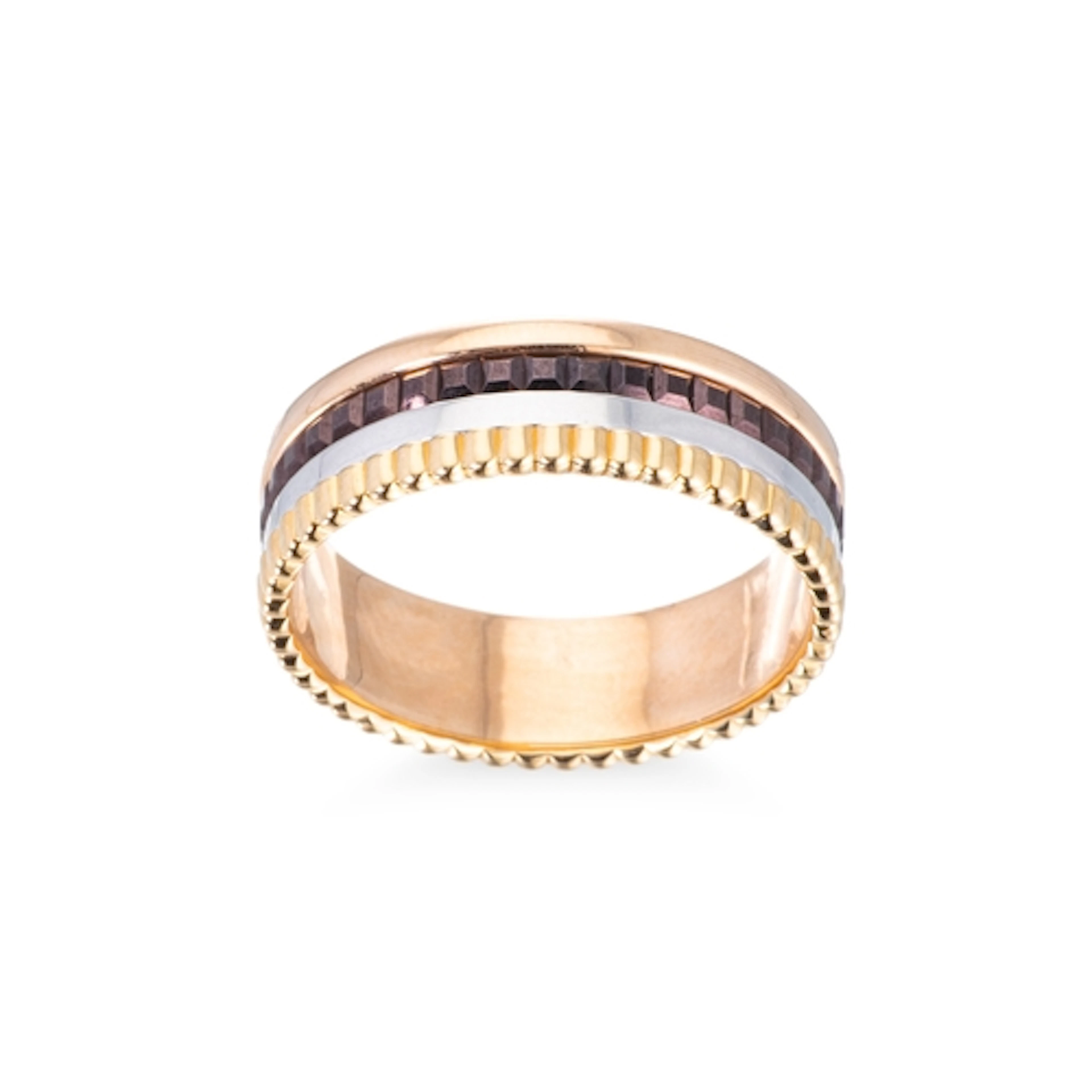 A BOUCHERON QUATRE RING, in 18ct three colour gold with tita...