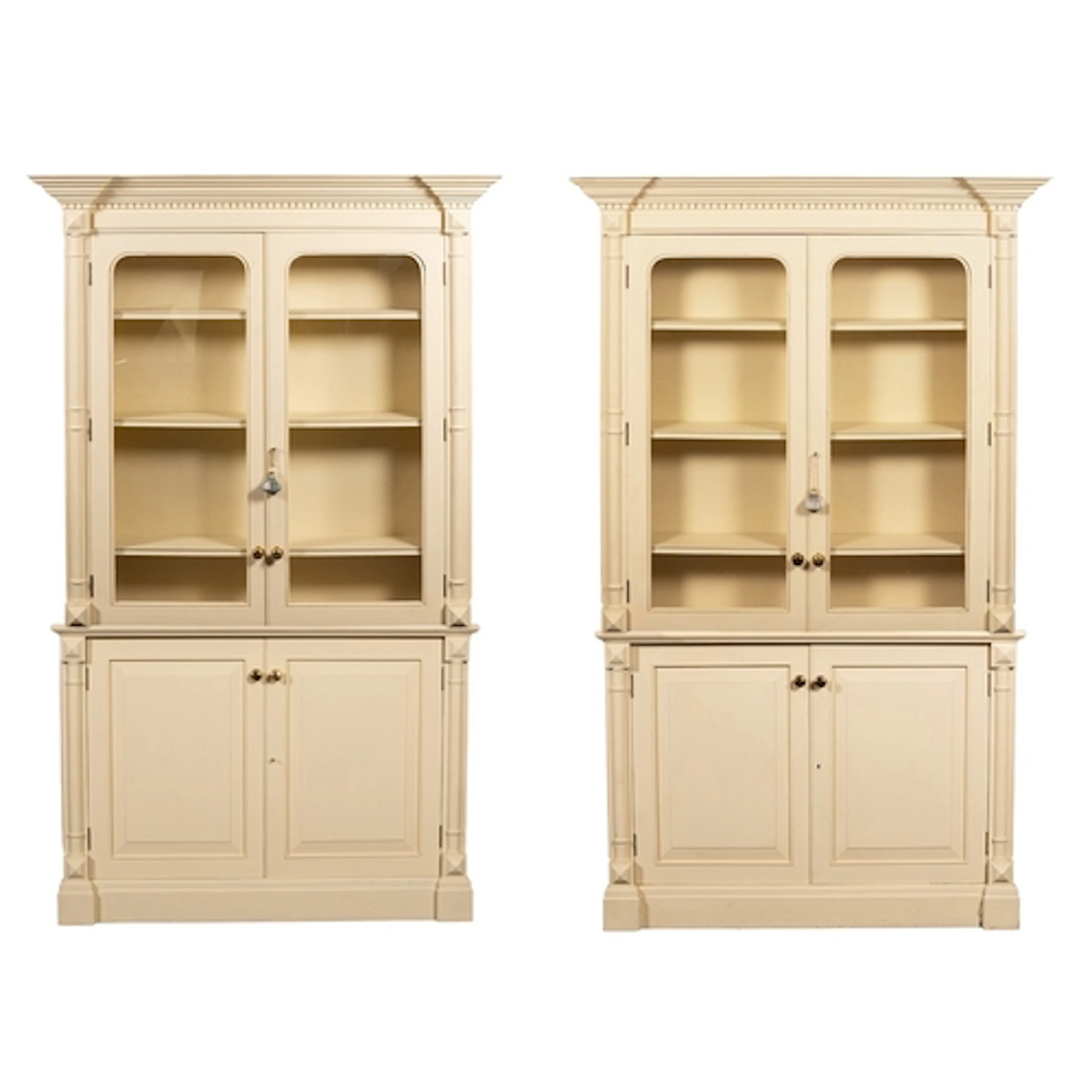 A pair of painted fibreboard and glazed library bookcases, i...