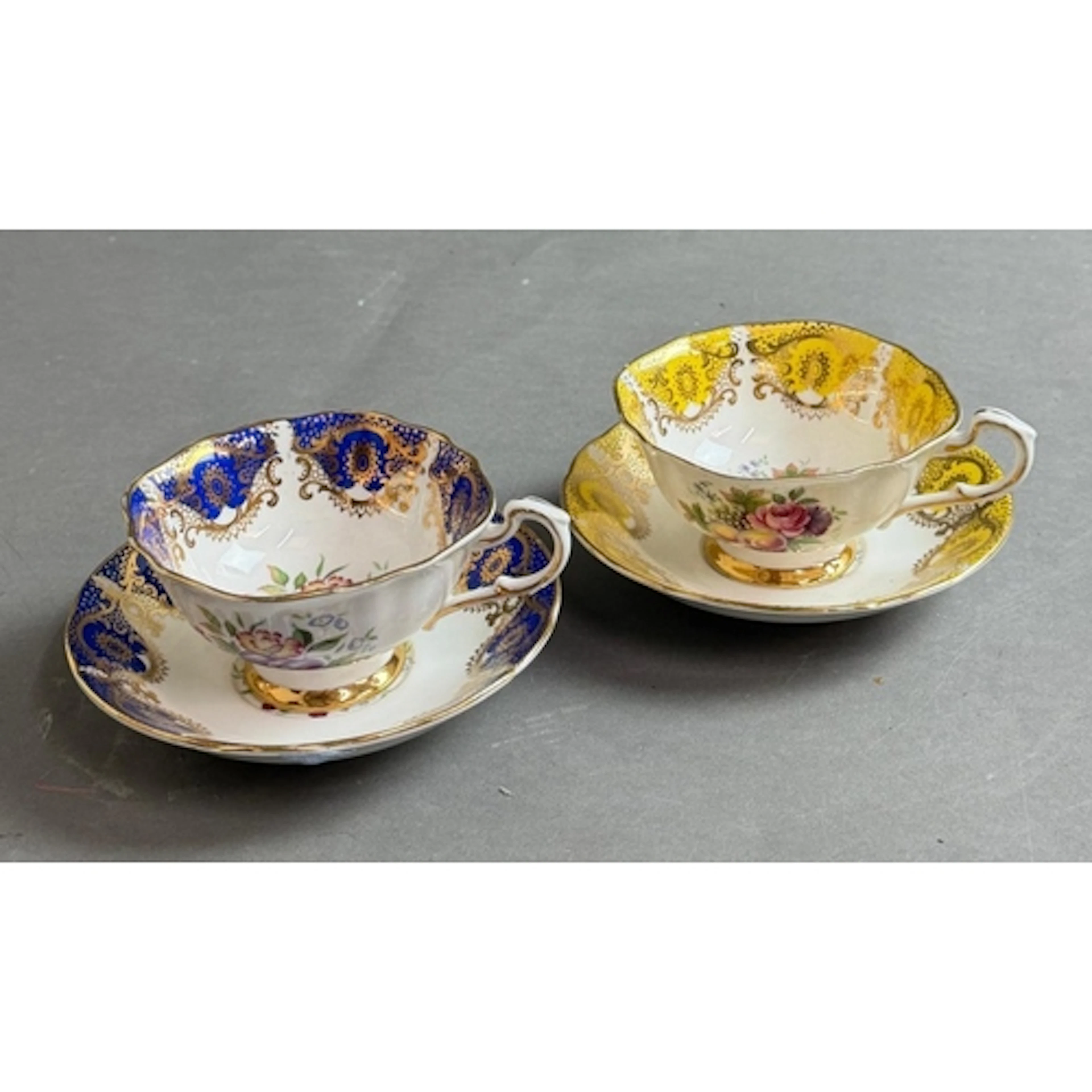 Two Paragn cups and saucers with a fruit and floral design ...