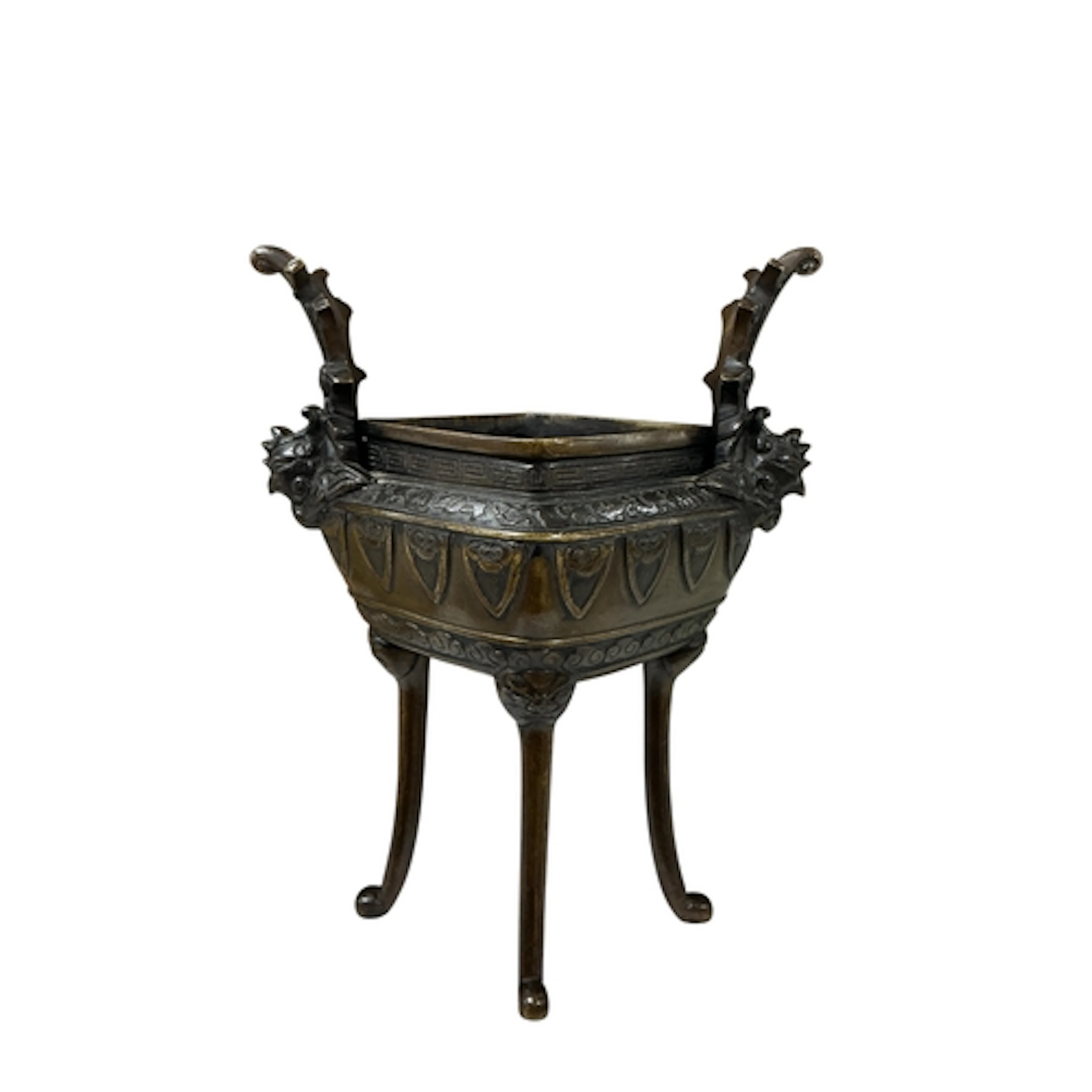 A Chinese bronze tripod censer to twin zoological handles, r...