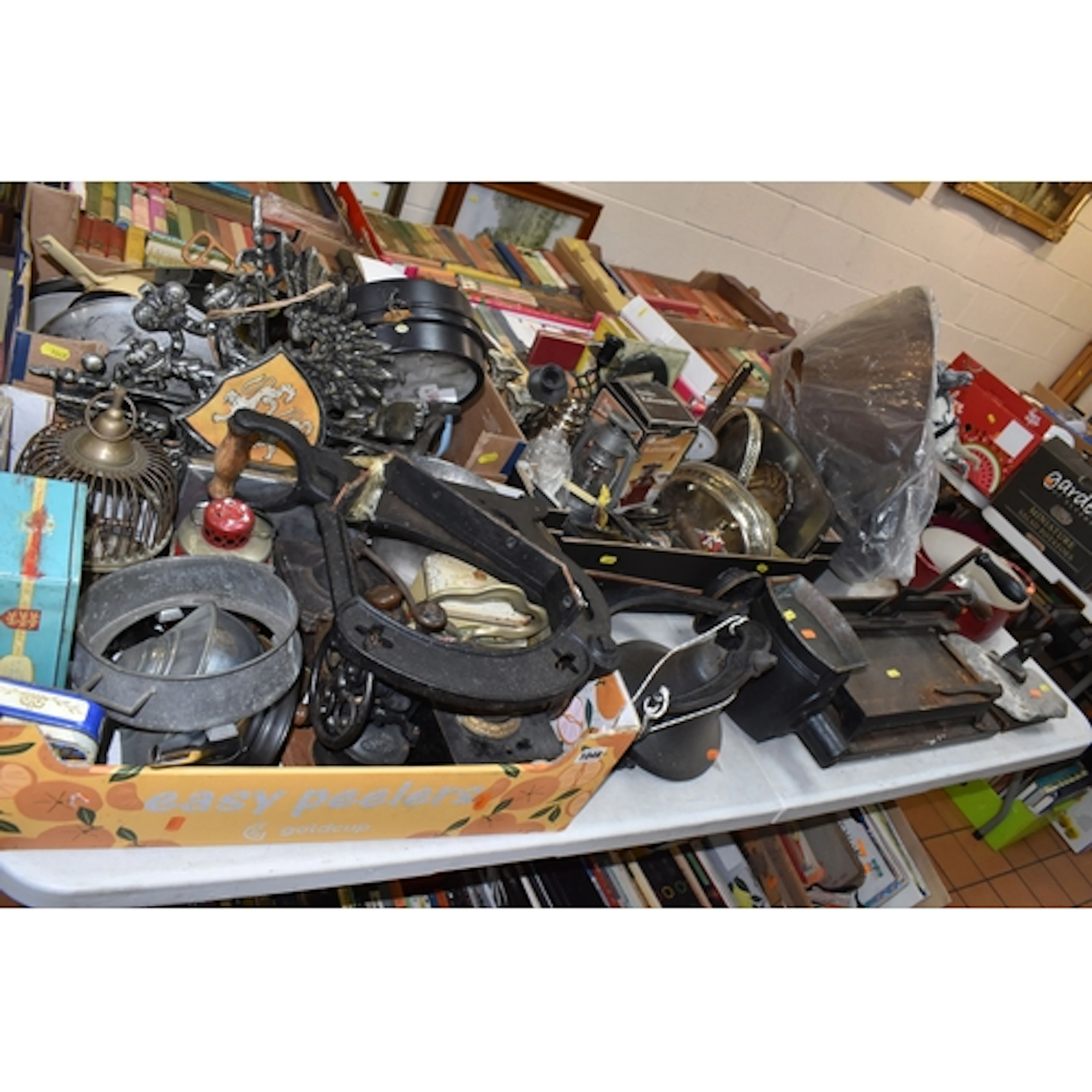 THREE BOXES AND LOOSE METALWARE, to include a vintage paper ...