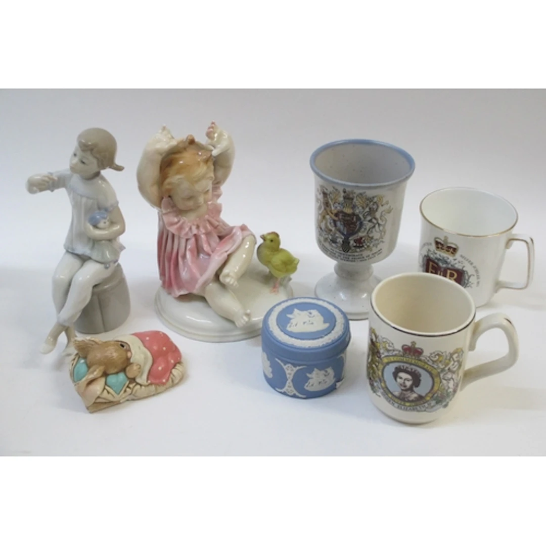 Karl Ens porcelain figure of a young child with a chick (at ...