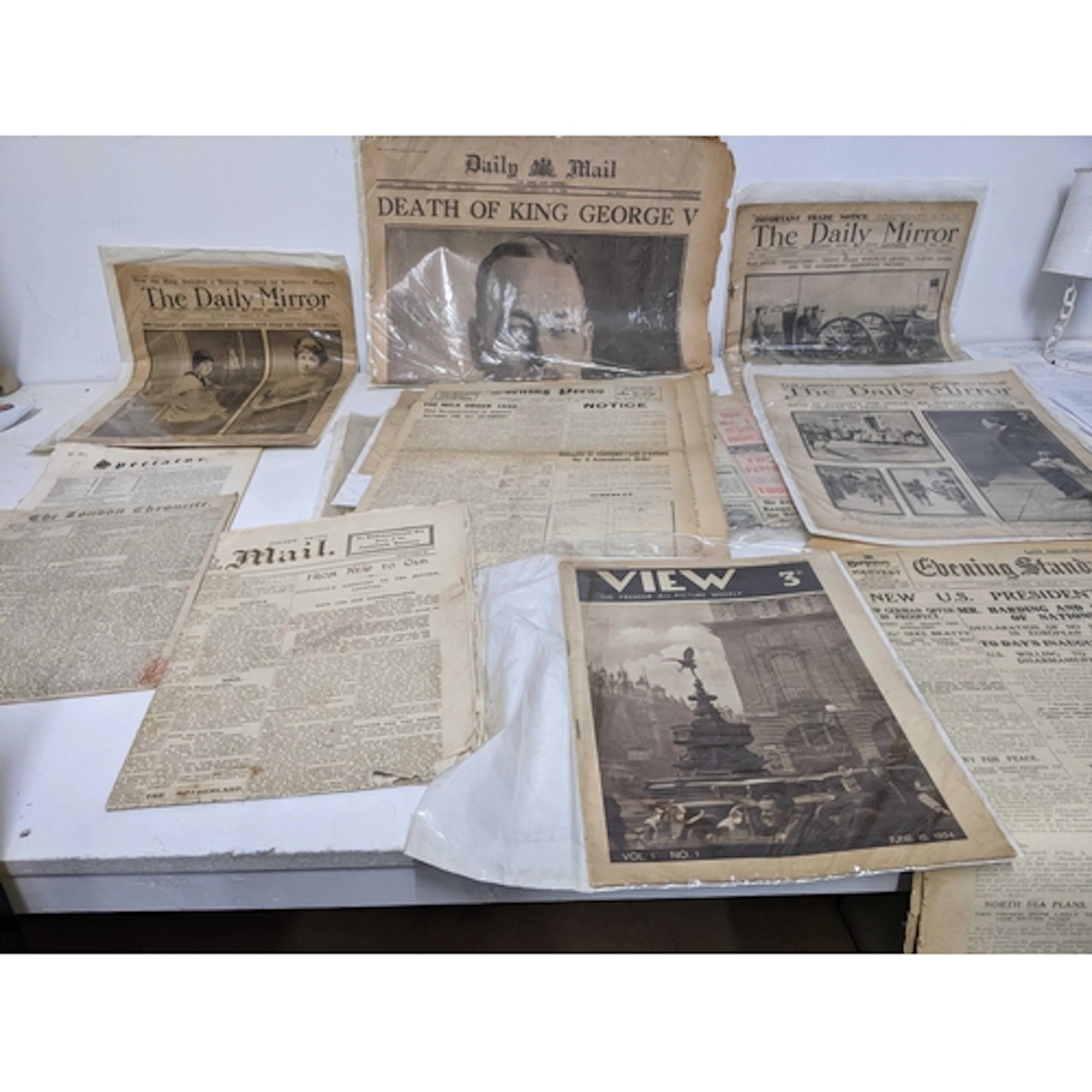 A group of vintage magazines and newspapers to include The L...