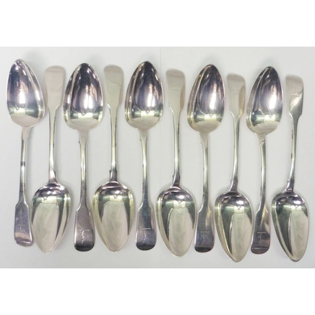 A set of ten George III Irish silver armorial engraved fiddl...