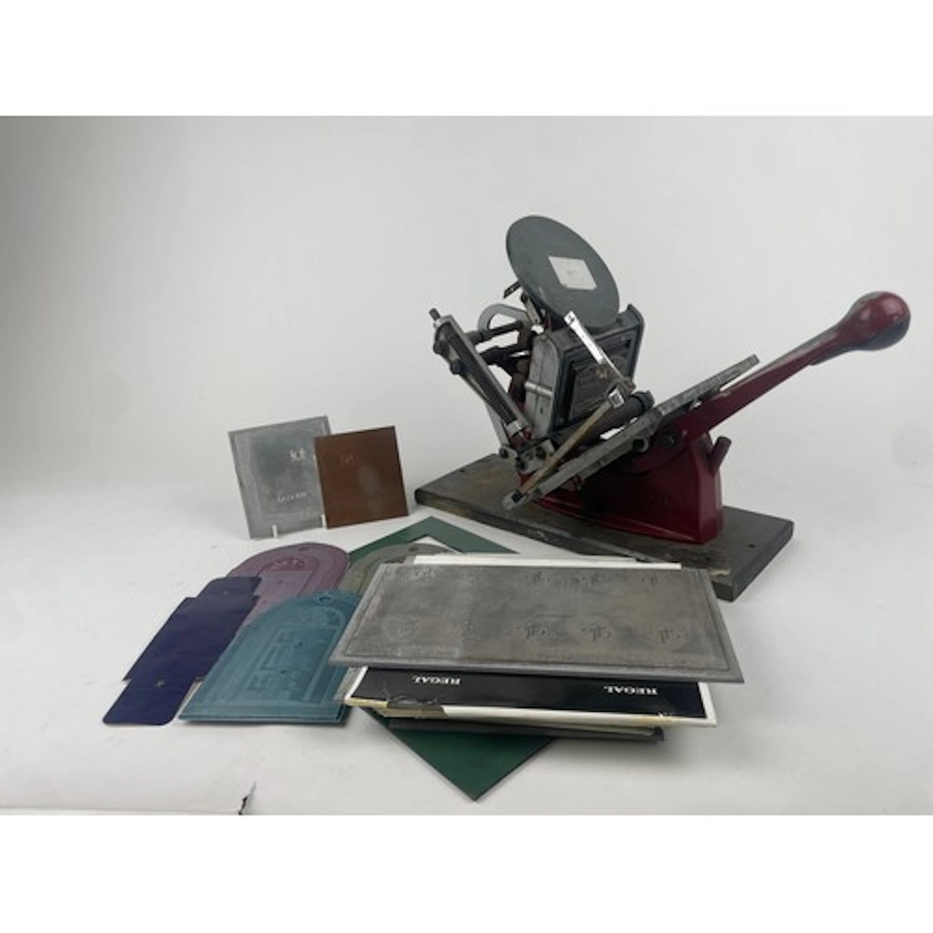 Advertising - a cast iron Adana Five-Three printing press, 2...