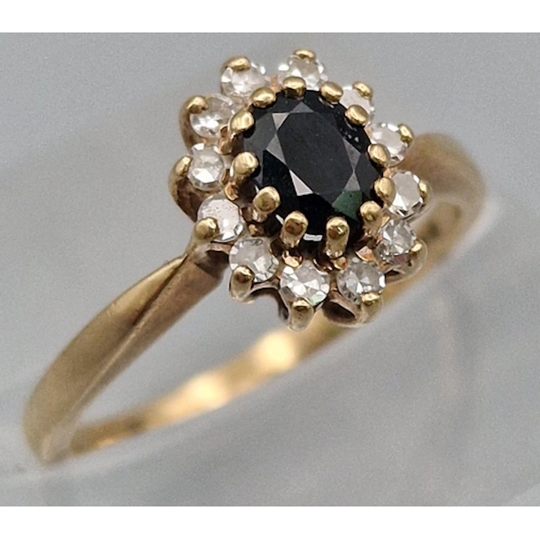 9ct gold diamond and sapphire flowerhead cluster ring. 2g ap...