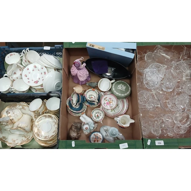 Four boxes of ceramics and glass to include a box of crystal...