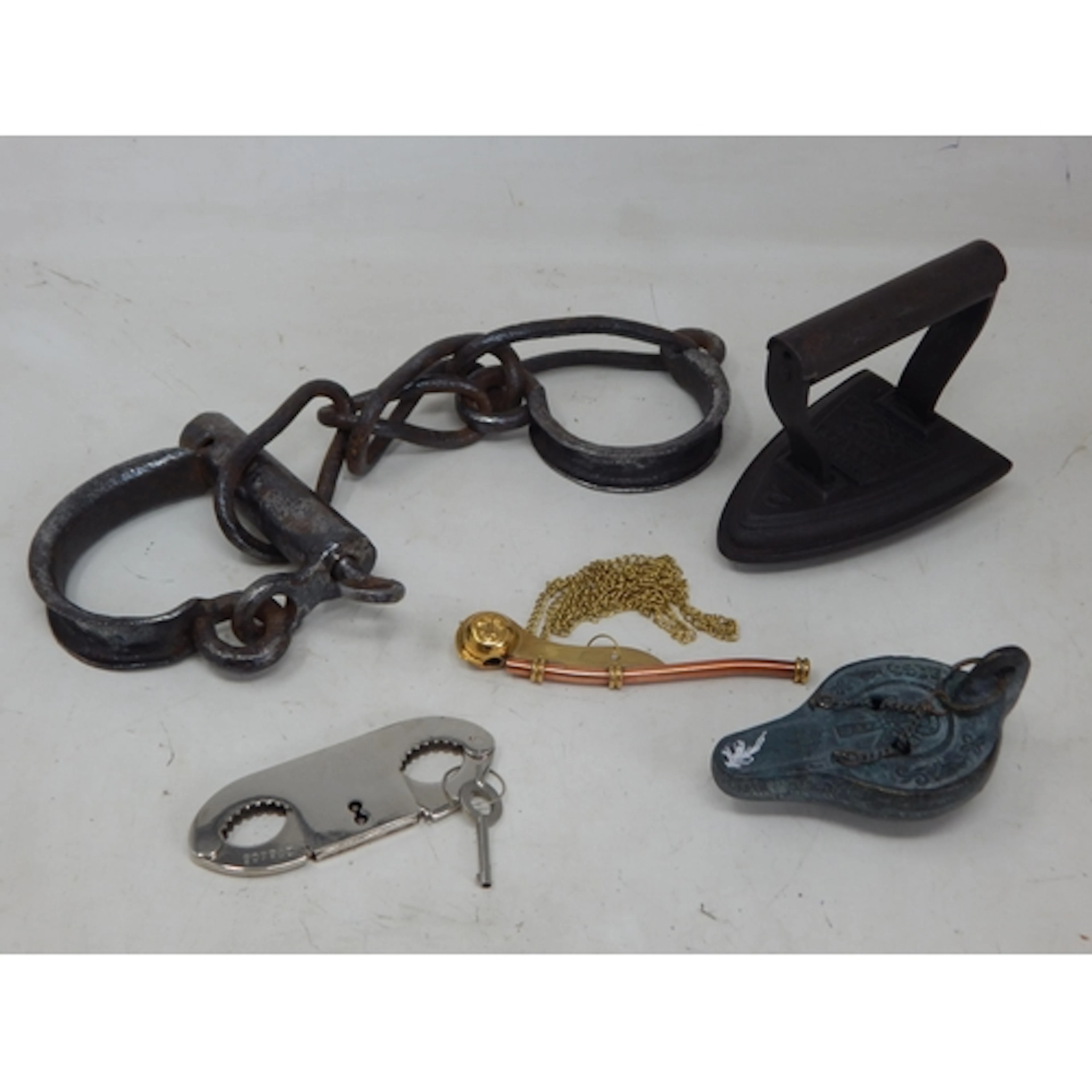 A Group of Items Including a Pair of Antique Forged Iron Leg...
