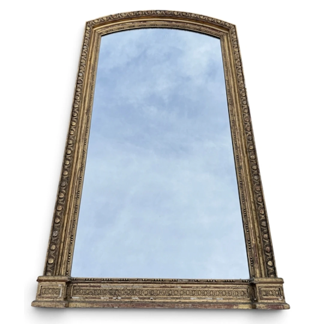 A 19TH CENTURY ITALIAN GILTWOOD AND GESSO ARCHED TOP OVERMAN...