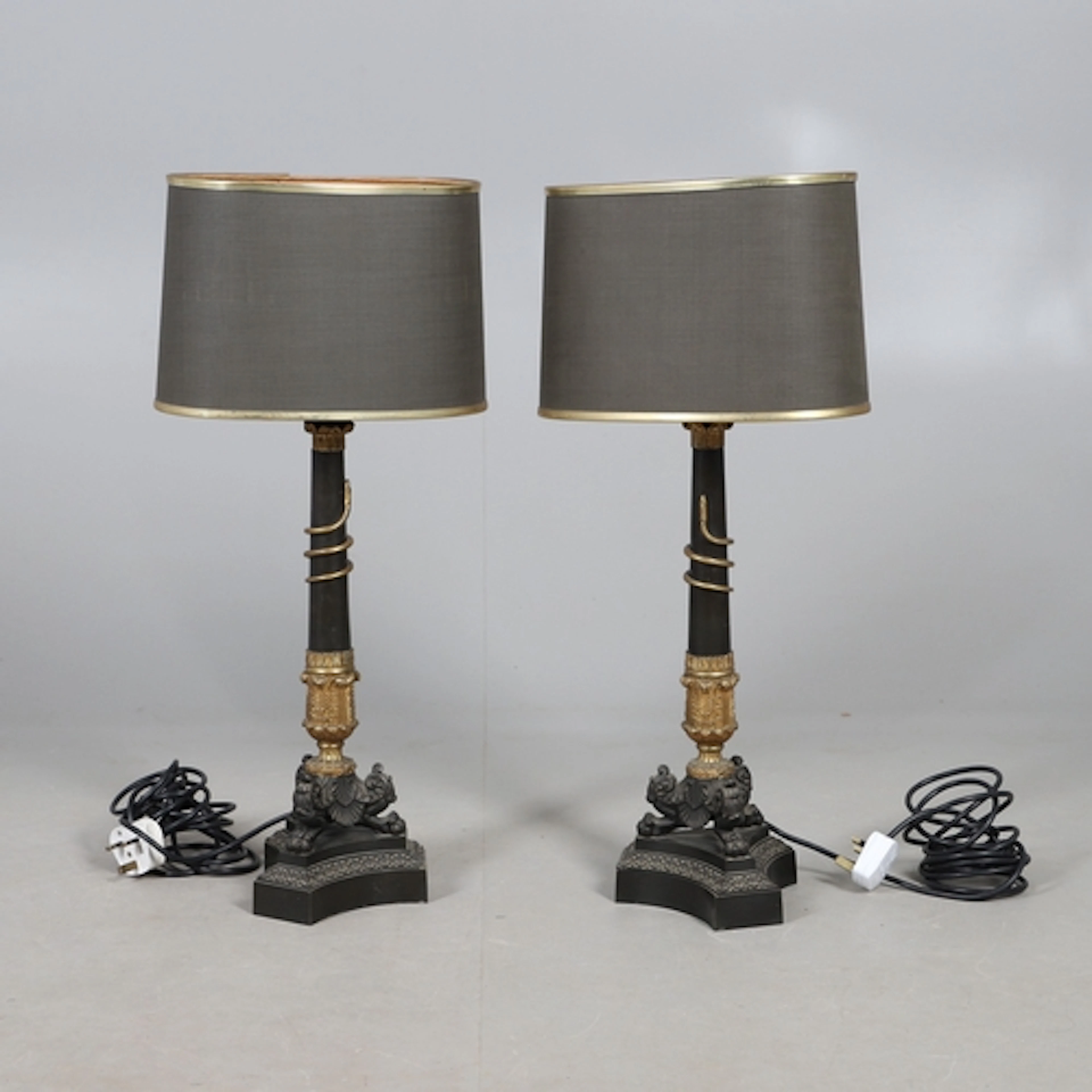 A PAIR OF 19TH CENTURY EMPIRE STYLE BRONZE AND ORMOLU CANDLE...