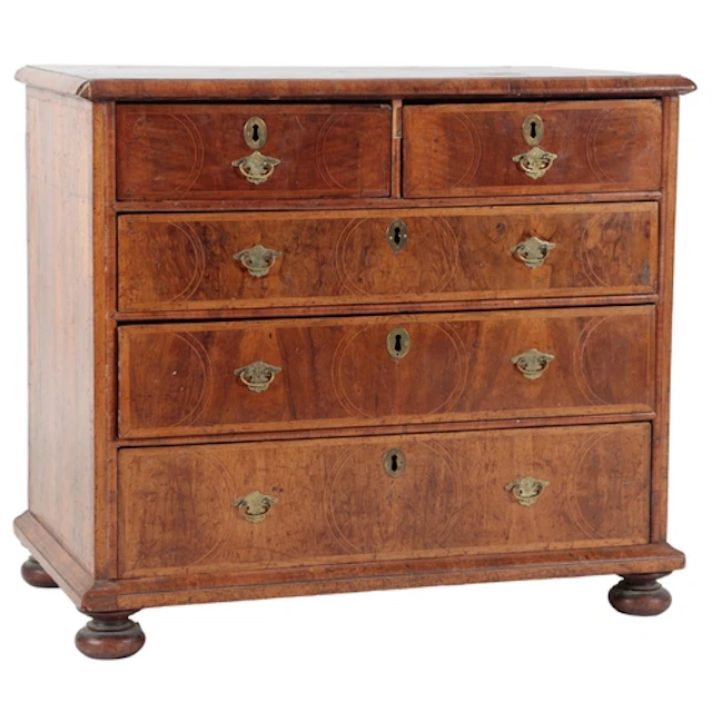 A Queen Anne walnut and holly strung chest of drawers, circa...