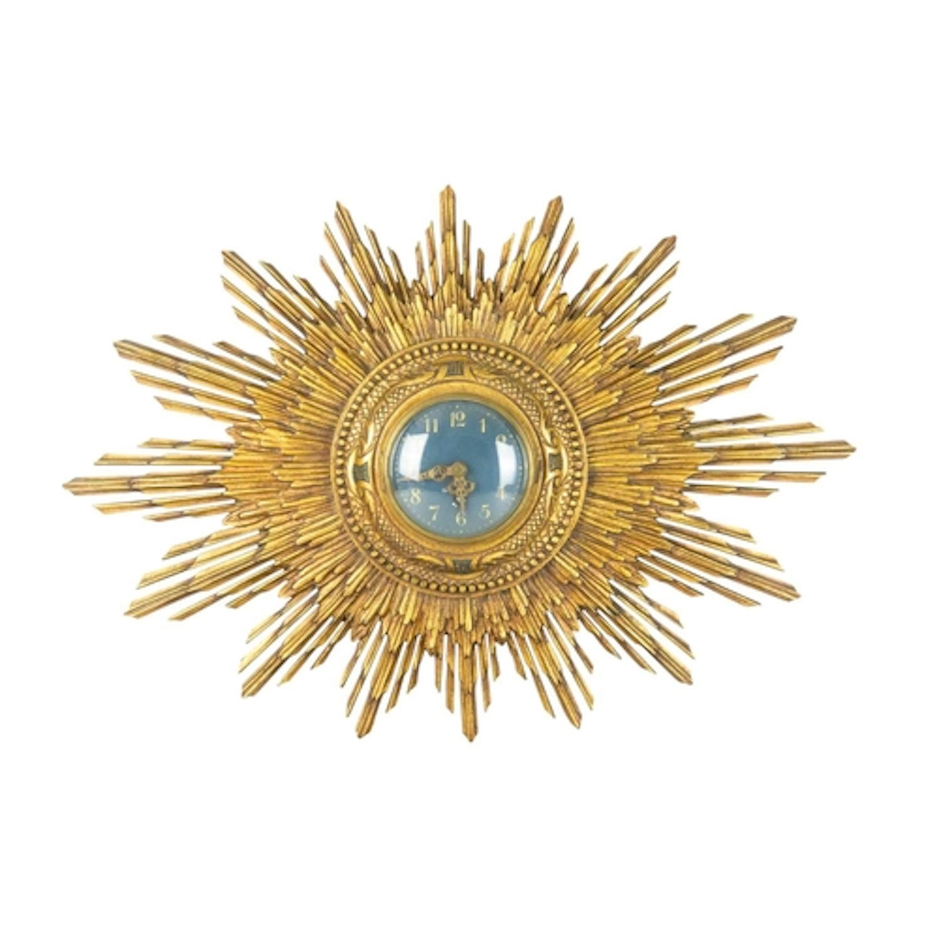 A gilt wood sunburst wall clock. Early 20th century, featuri...