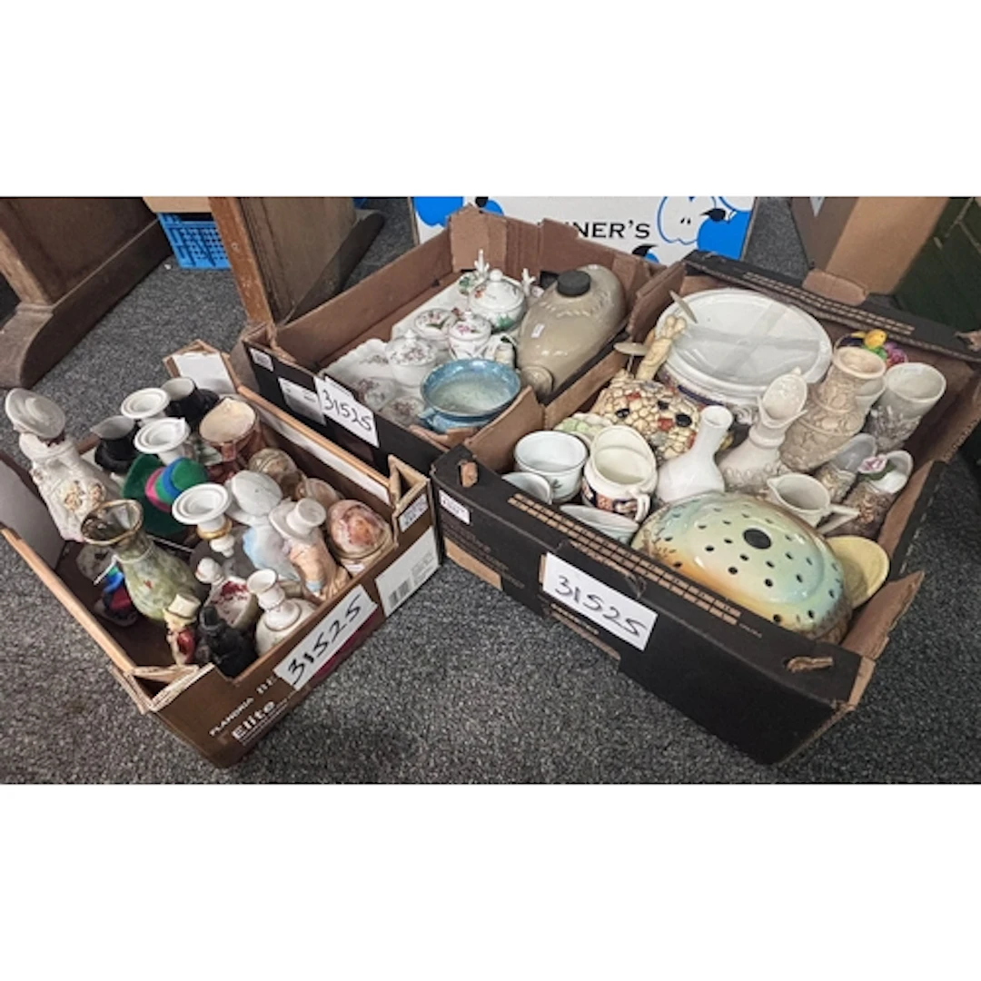 Three boxes of ceramics to include table candelabra, figurin...