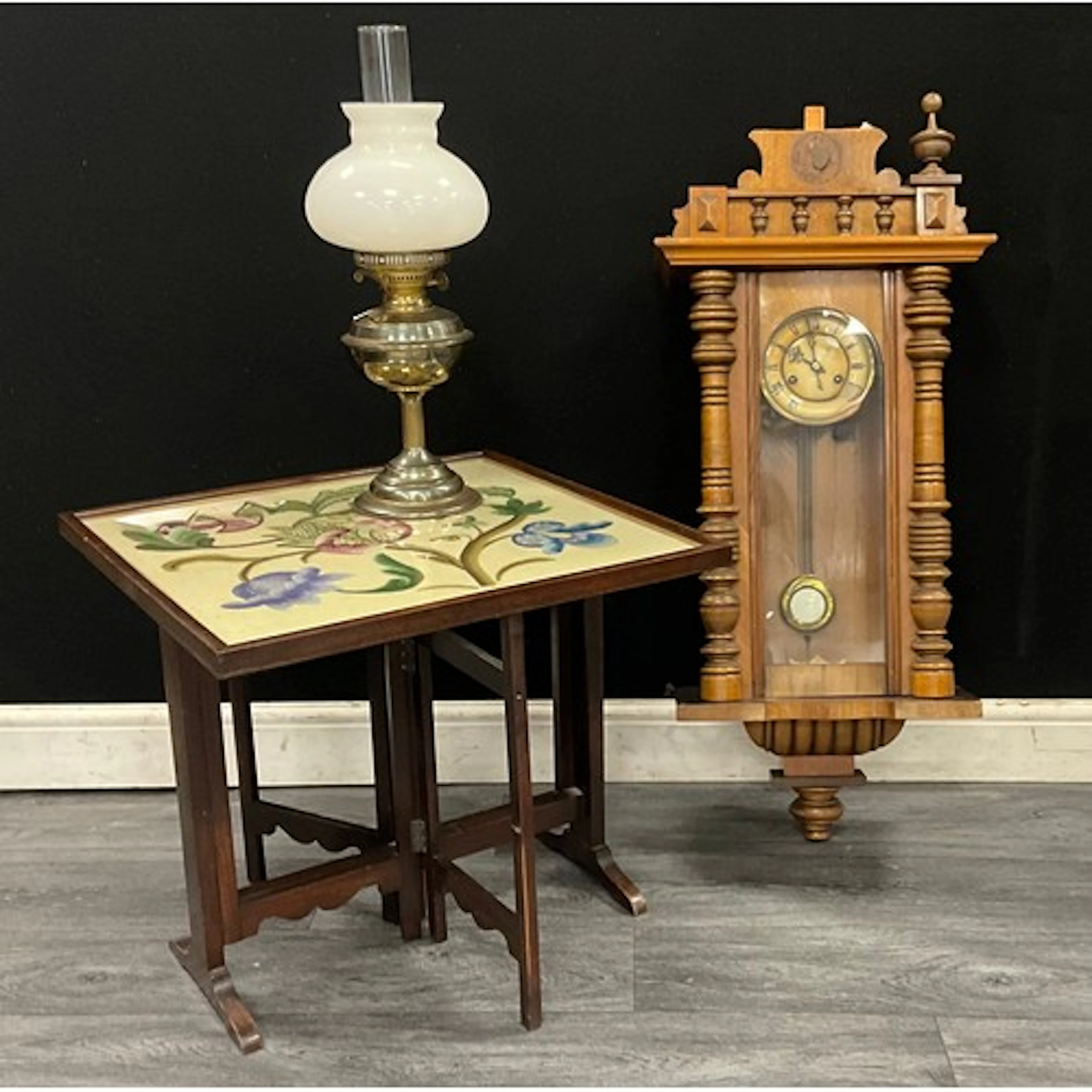An Oak framed metamorphic Firescreen/Table, with wool work f...