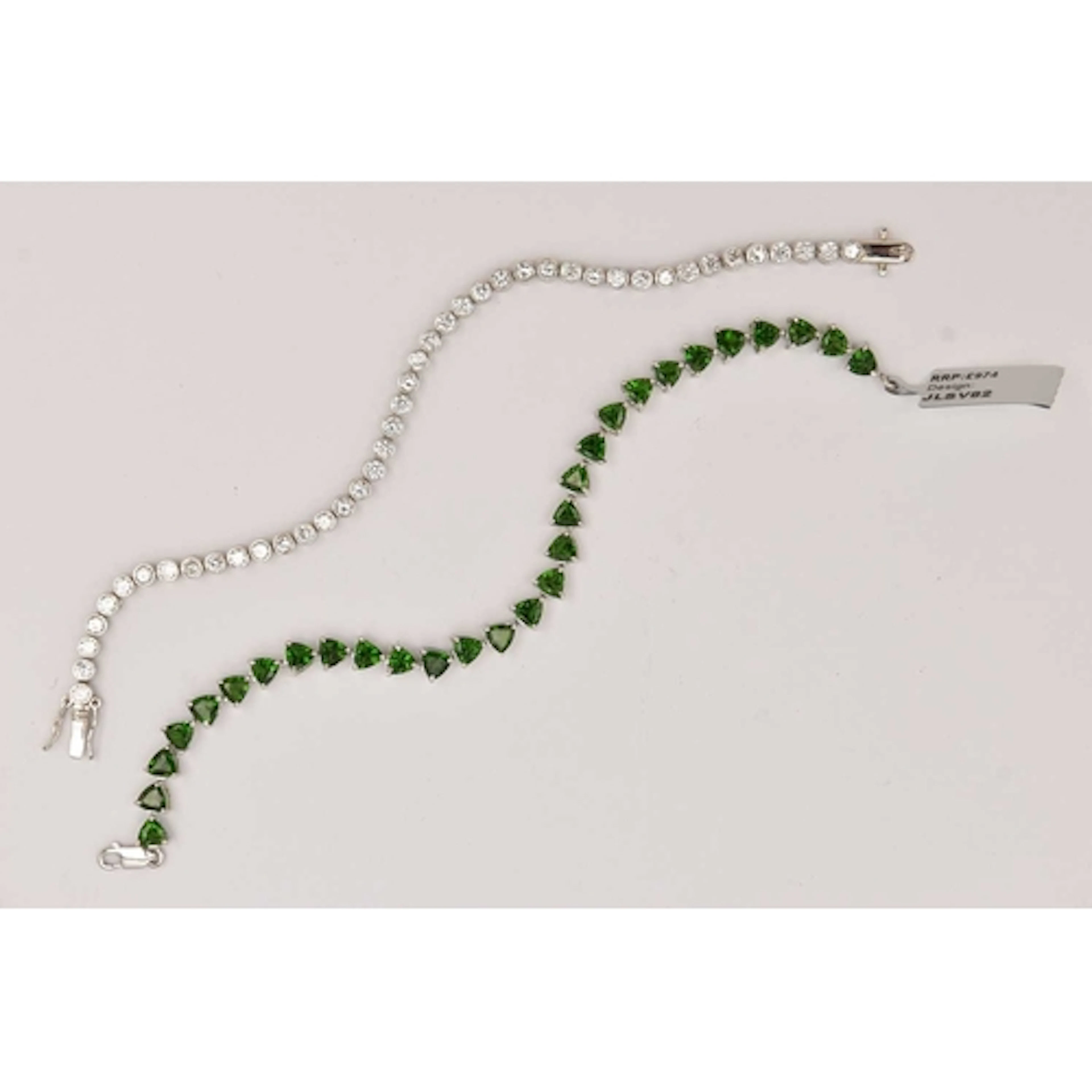 TWO GEM SET LINE BRACELETS, the first a cubic zirconia line ...