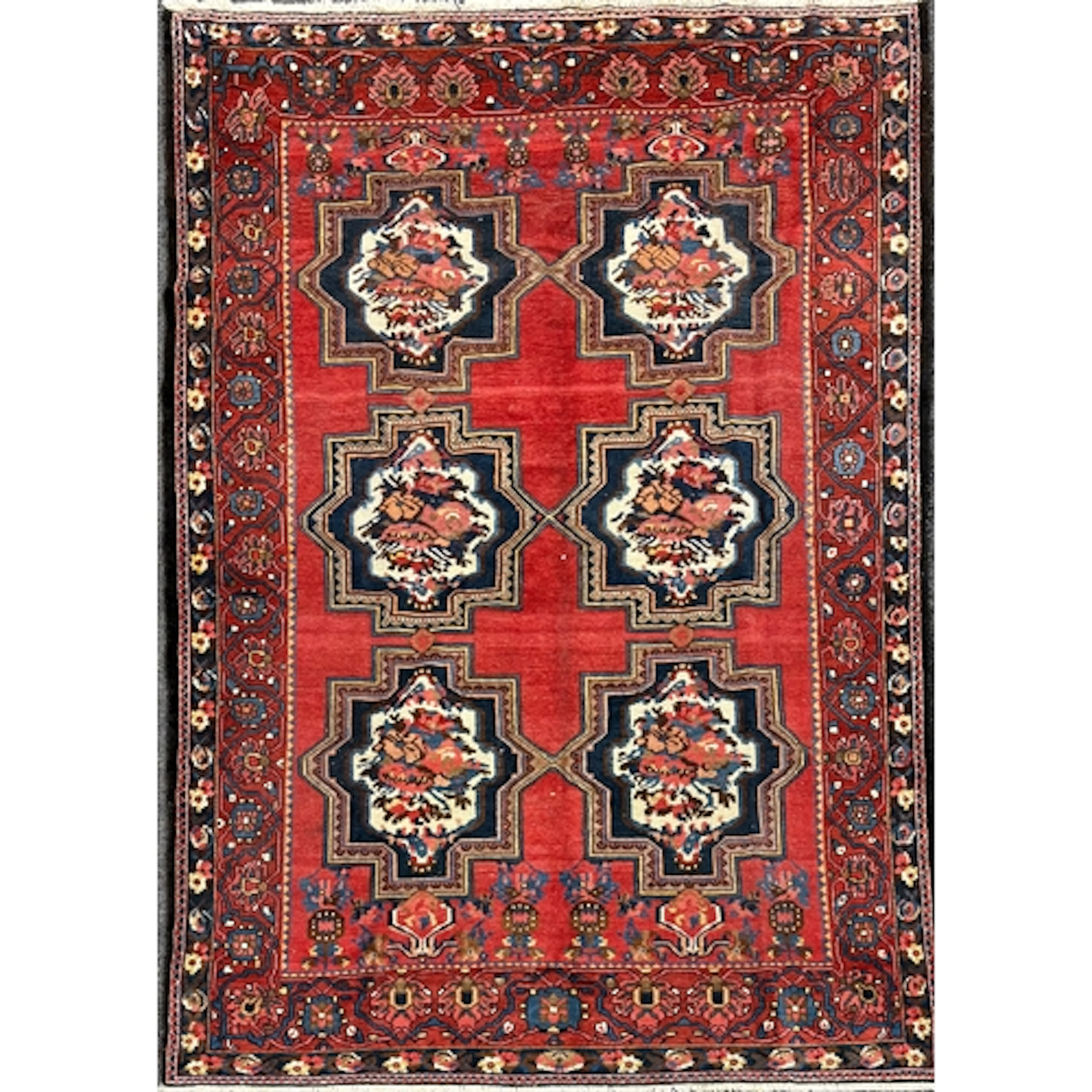 A Persian Karabagh Rug, with 6 large stepped medallions in a...