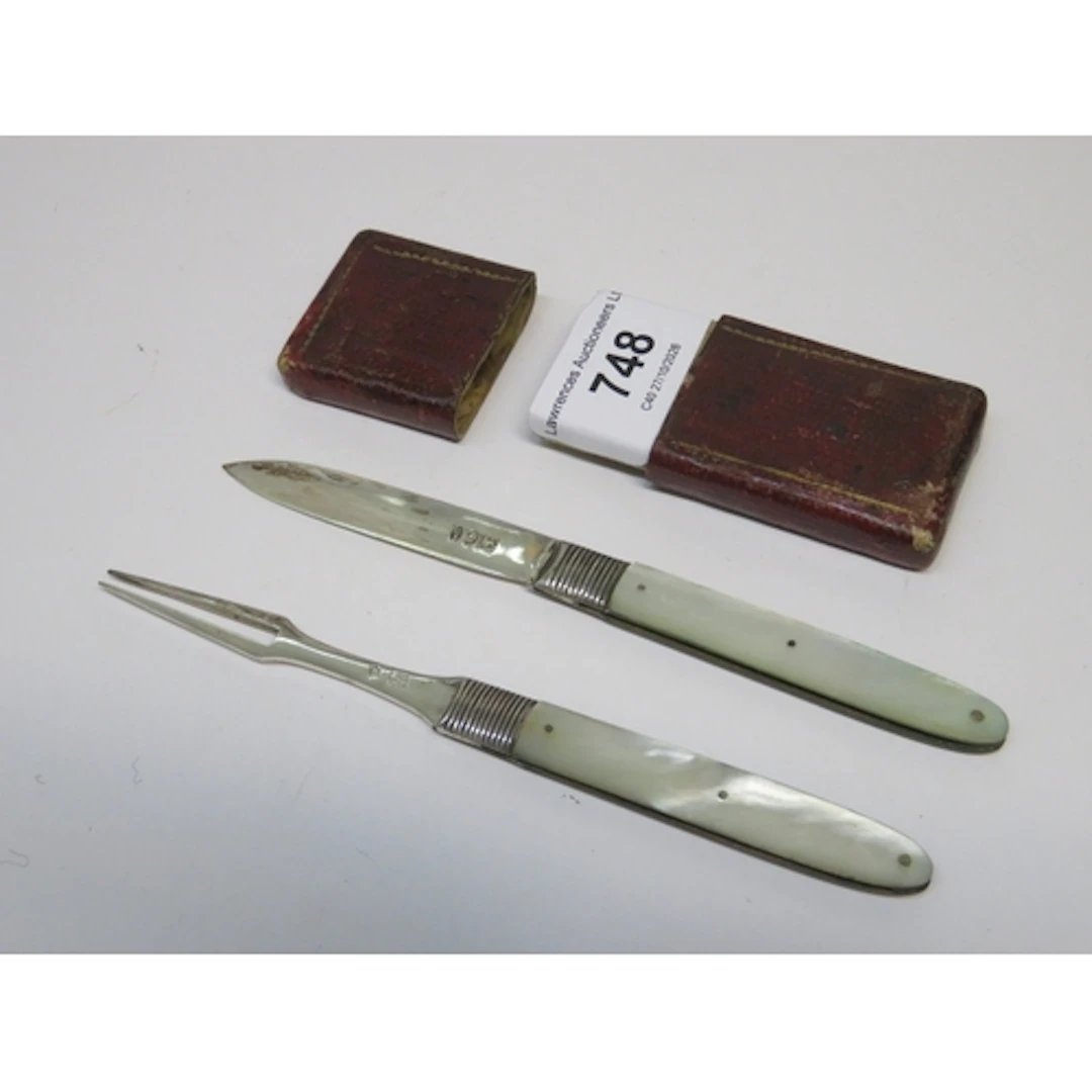 Cased pair of Georgian silver and mother of pearl folding kn...