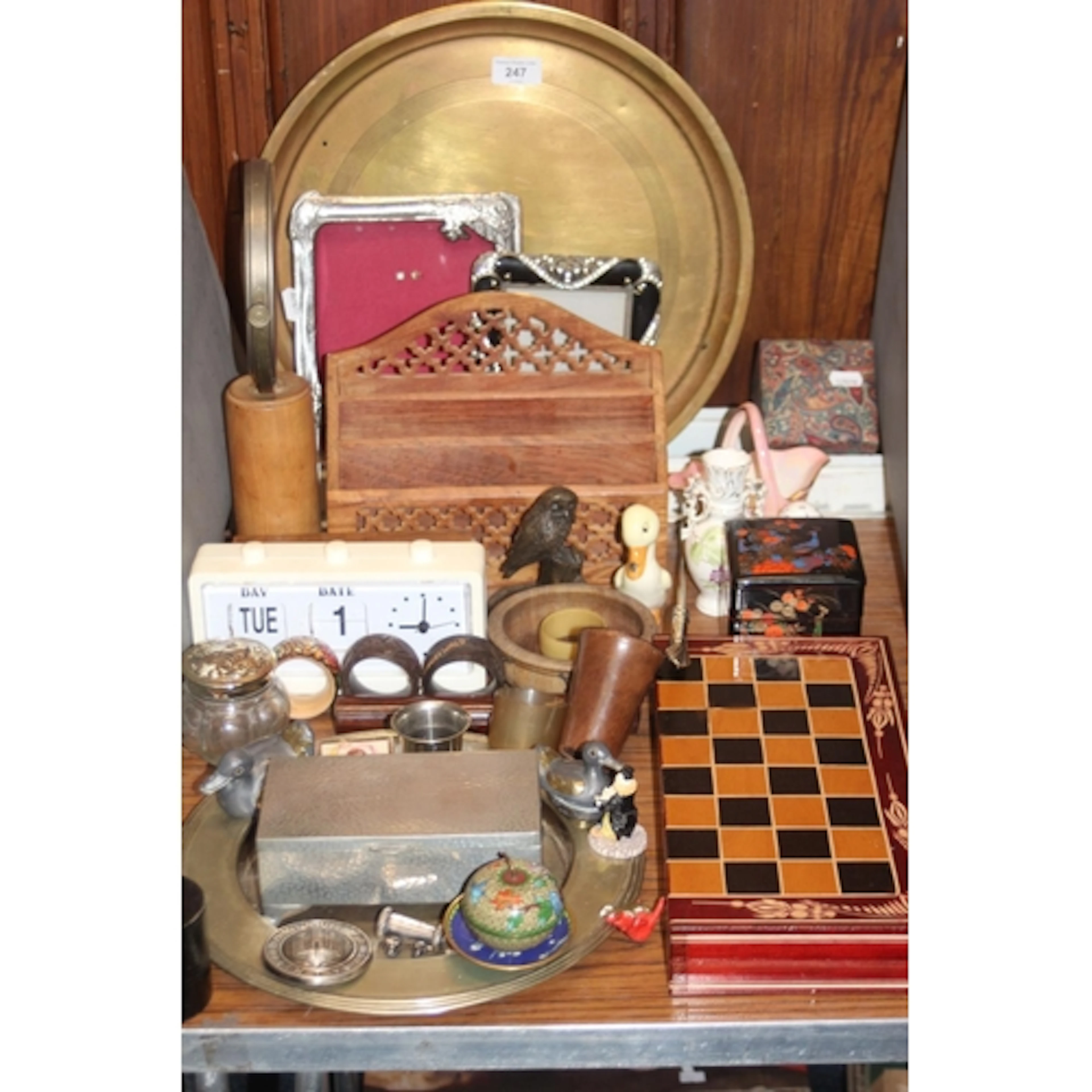 Mixed items to include brass charger, photo frames, napkin r...