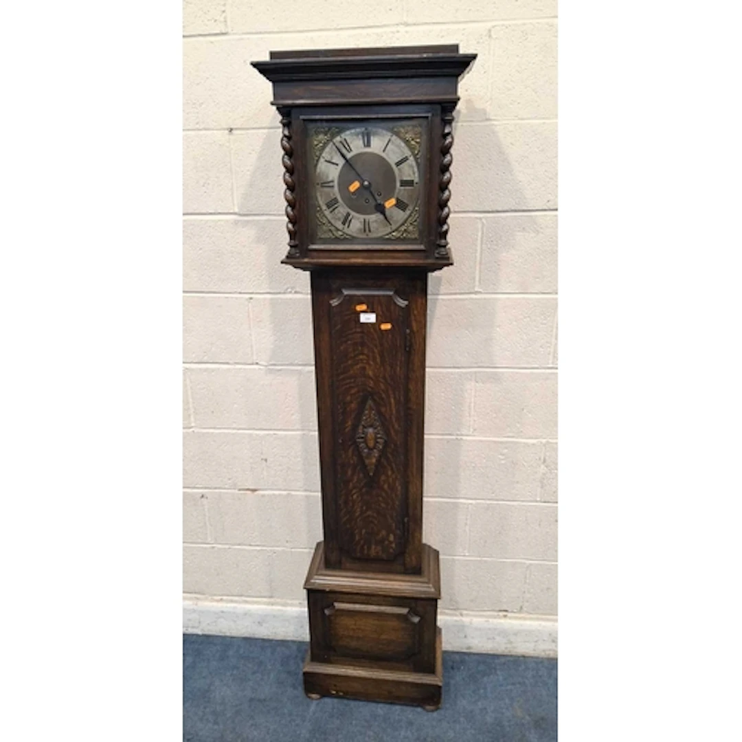 AN EARLY 20TH CENTURY OAK CASED LONGCASE CLOCK, the glass do...