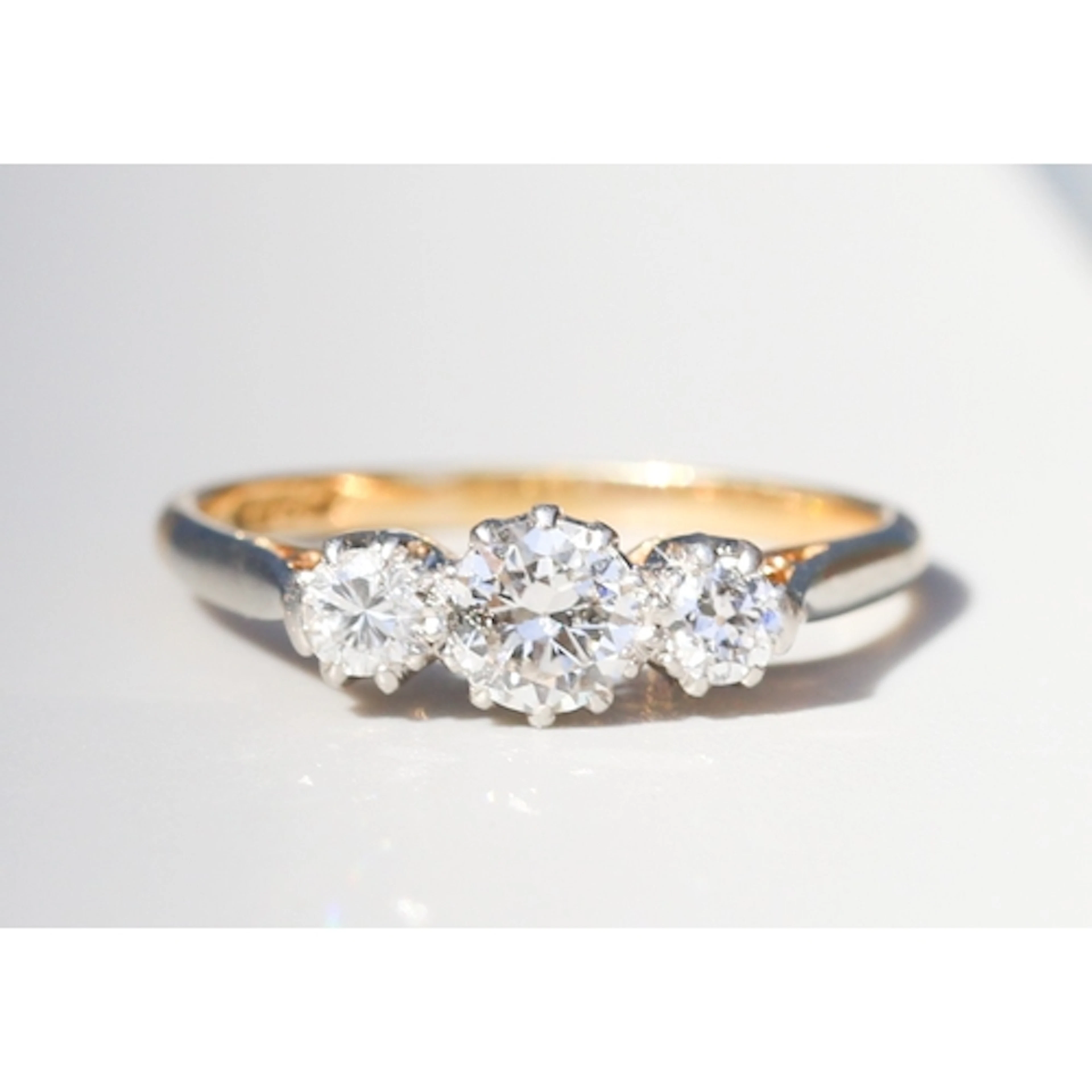 Round Brilliant Cut Diamond Three Stone Graduated Form Ring,...