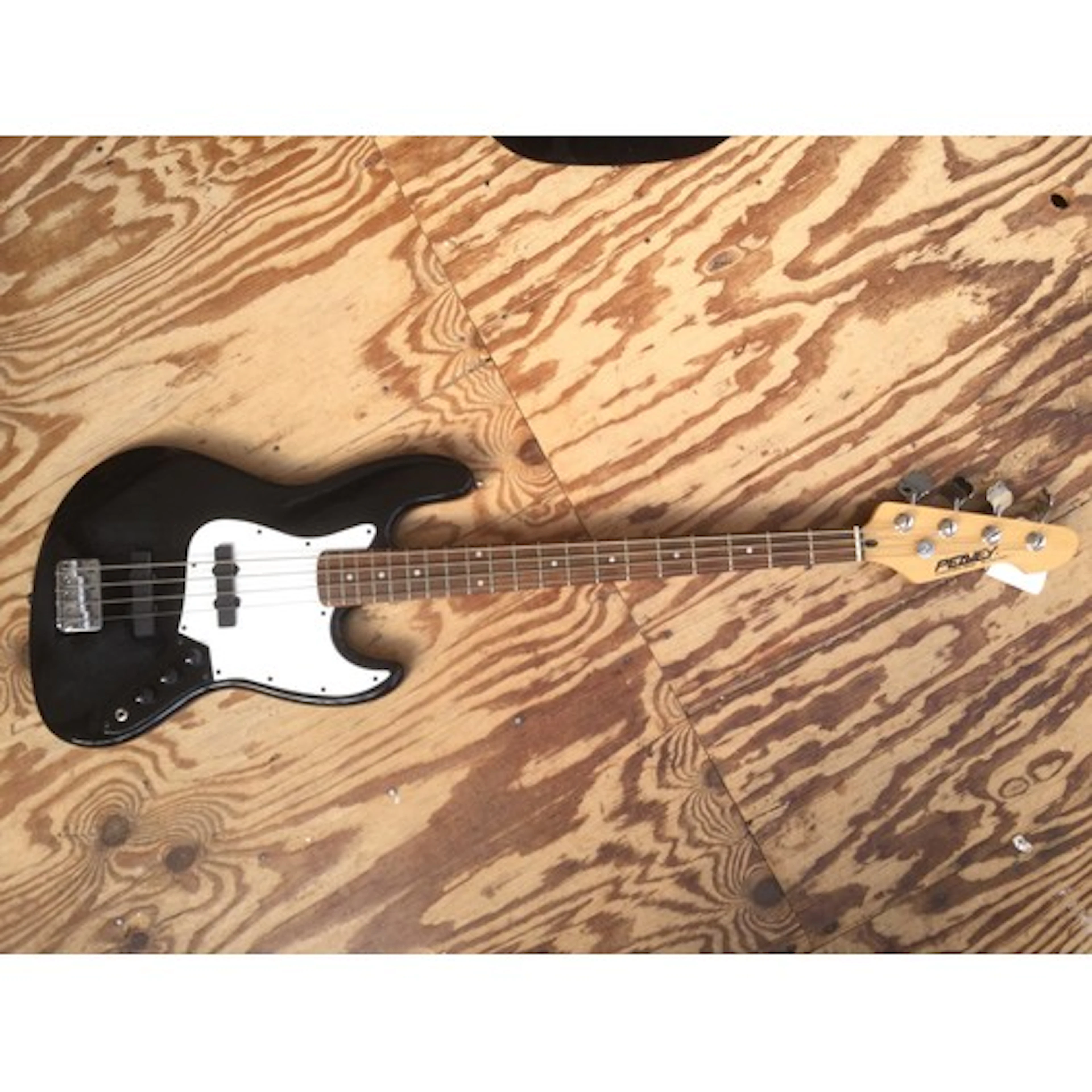 A Peavey International Series bass guitar. No case.