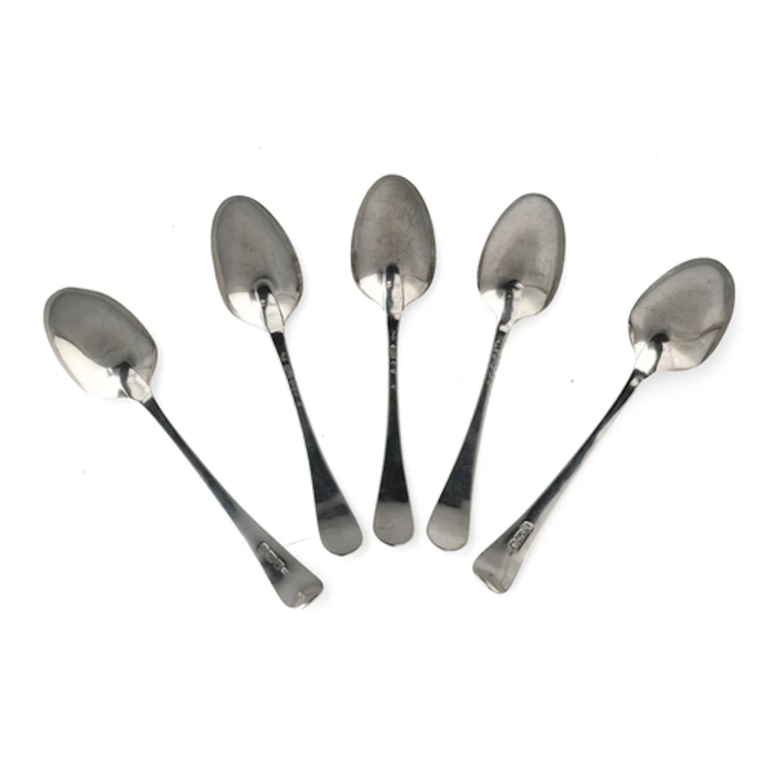 A SET OF THREE EARLY GEORGE III SILVER TABLESPOONS, STRETCHE...