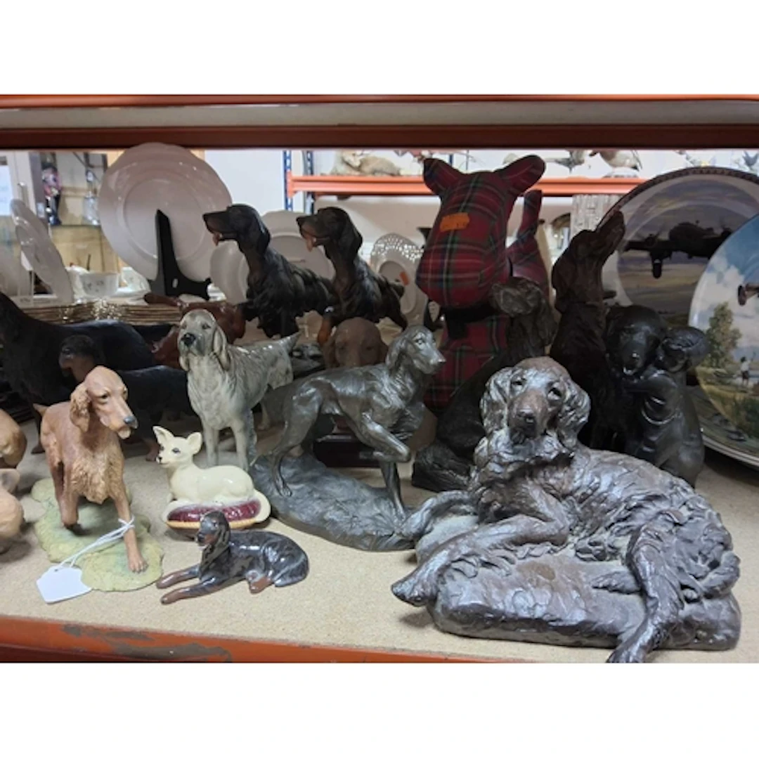 A COLLECTION OF DOG ORNAMENTS to include various dog ornamen...