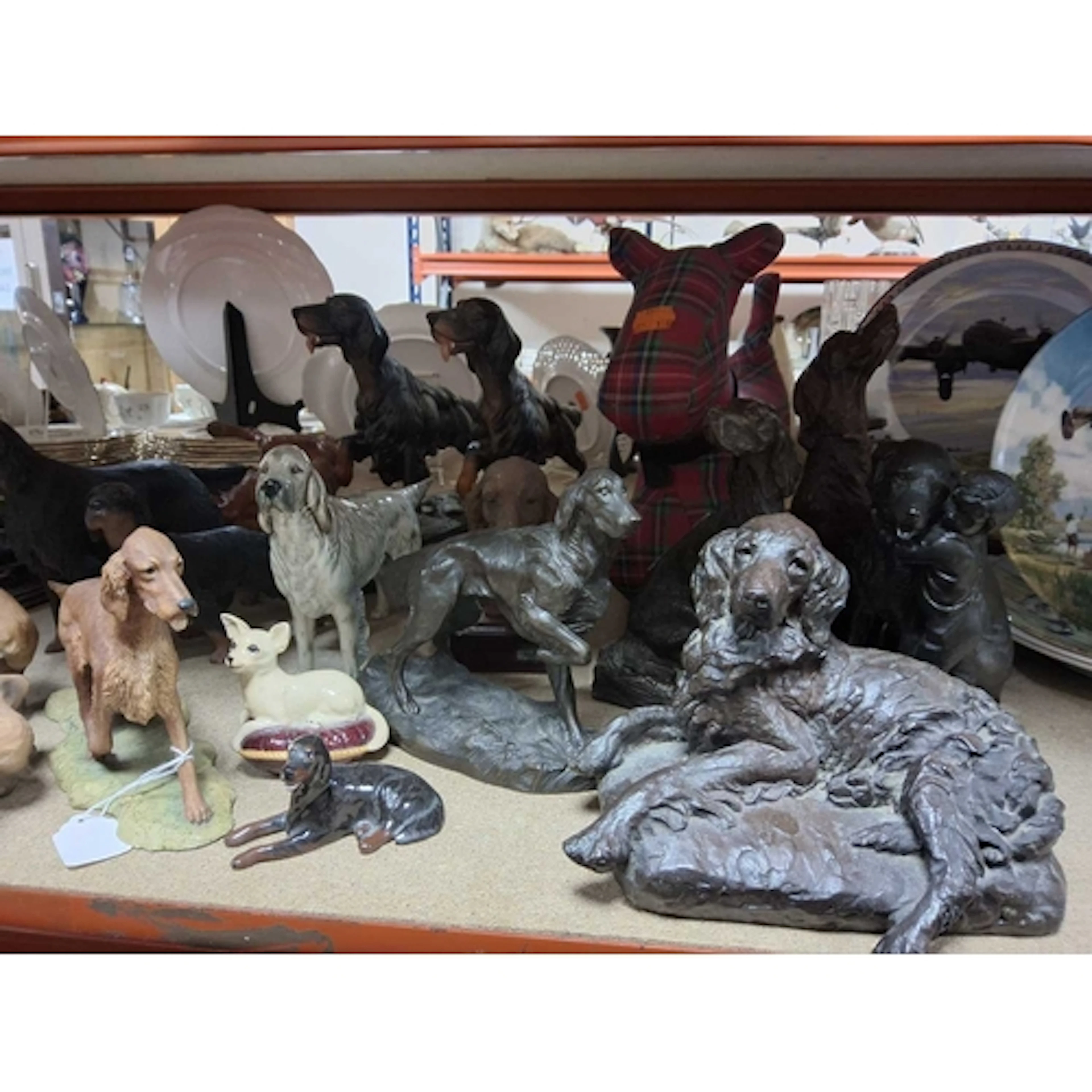 A COLLECTION OF DOG ORNAMENTS to include various dog ornamen...
