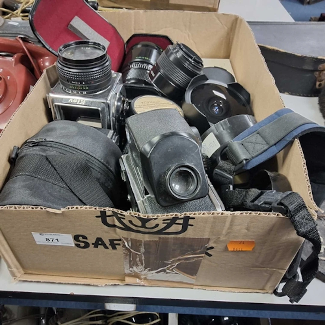 A GROUP OF VINTAGE UKRAINIAN CAMERAS AND LENSES to include t...